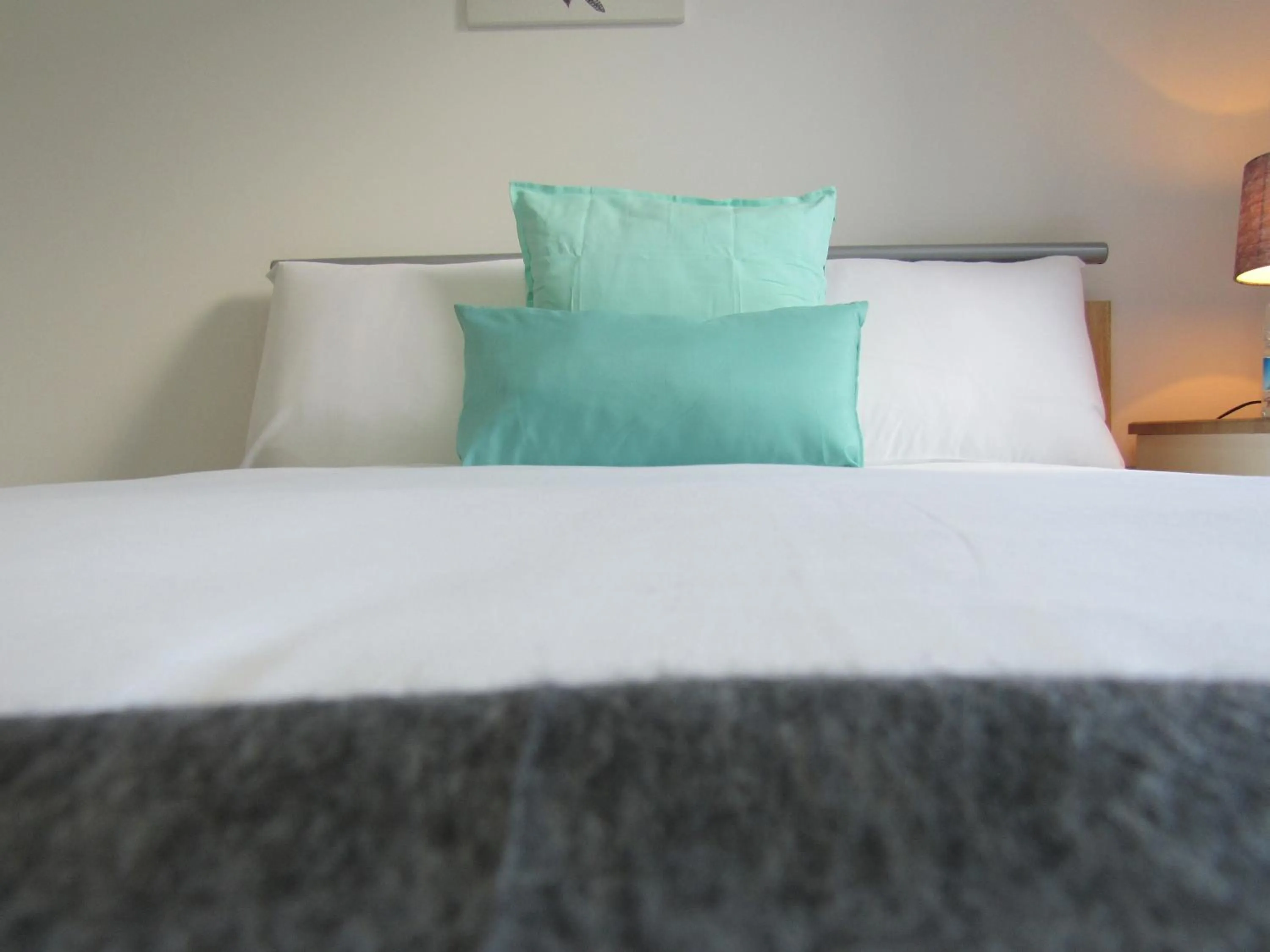 Bed in The Tas Suites - Tas Accommodations