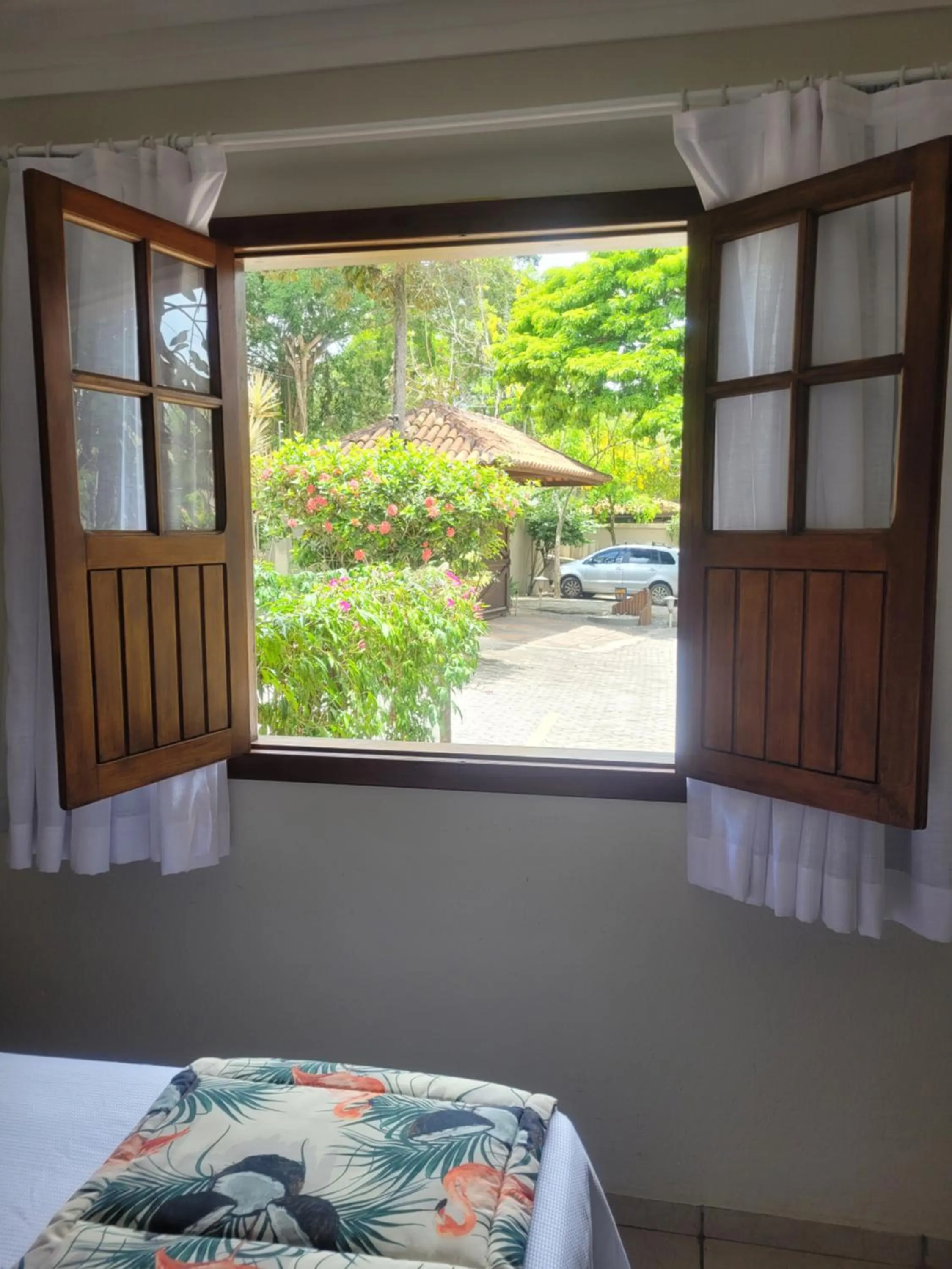 Garden view, Bed in Residencial Maria Pitanga