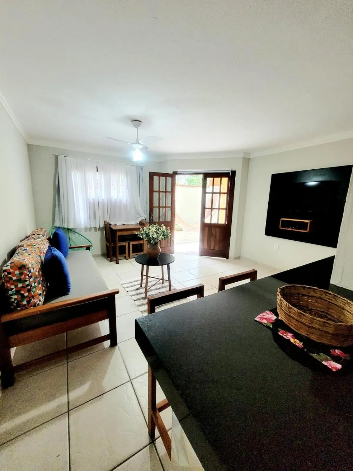 Communal lounge/ TV room, Bed in Residencial Maria Pitanga