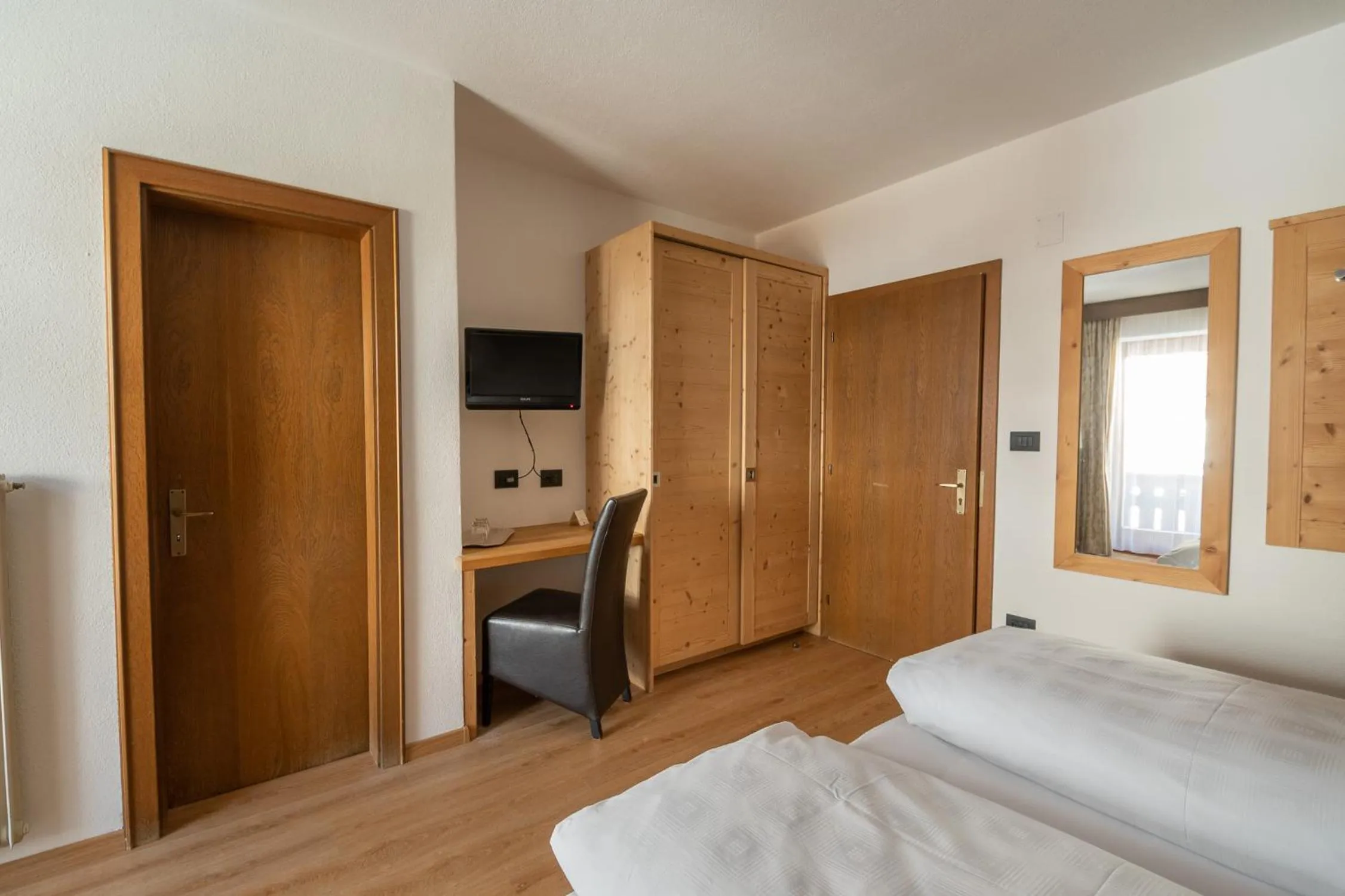 Bed in Garni Ciasa Tamà Sas di Pezzedi Eriberto e Neumair Hermine