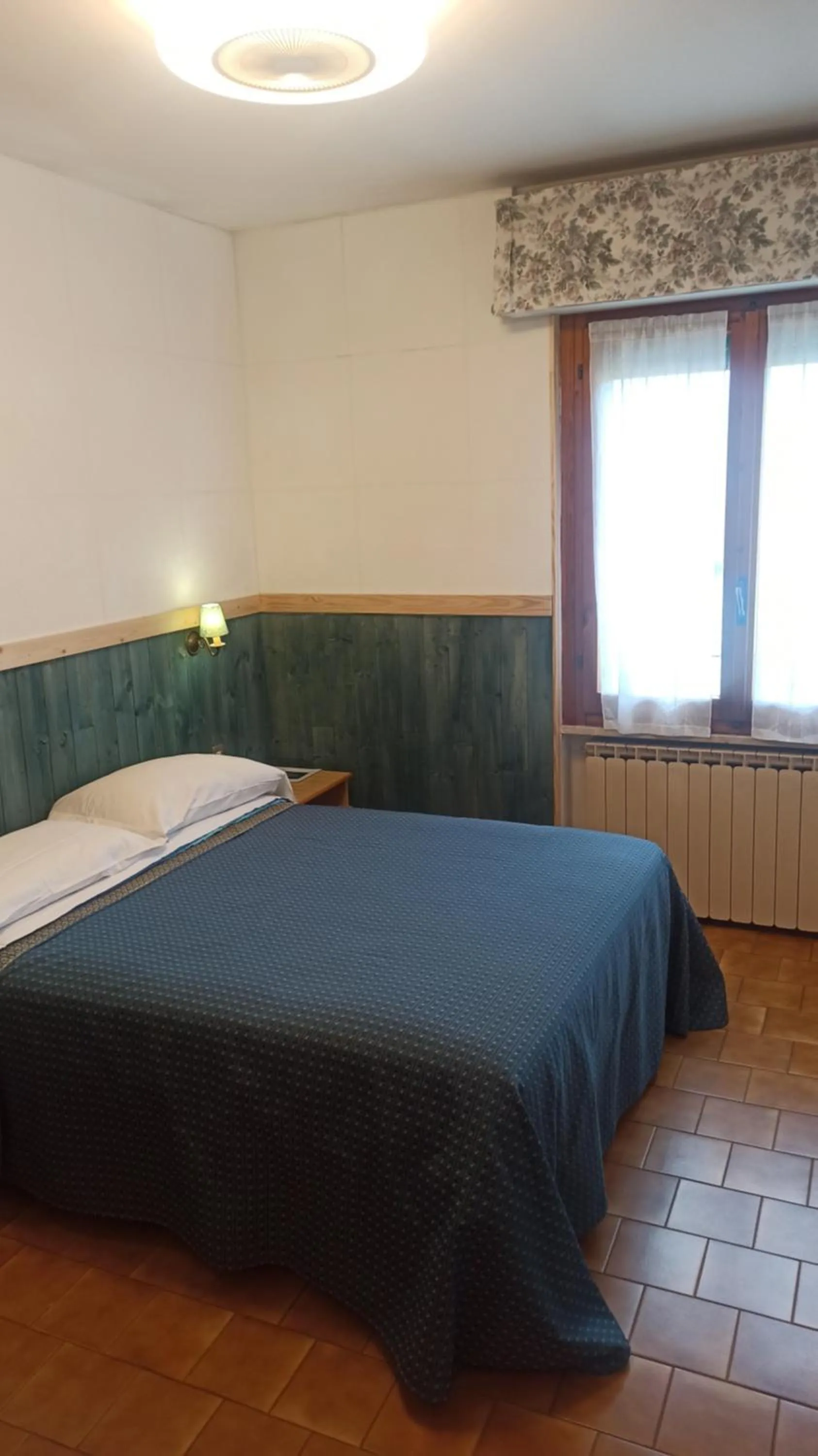 Bed in Albergo Le Rose