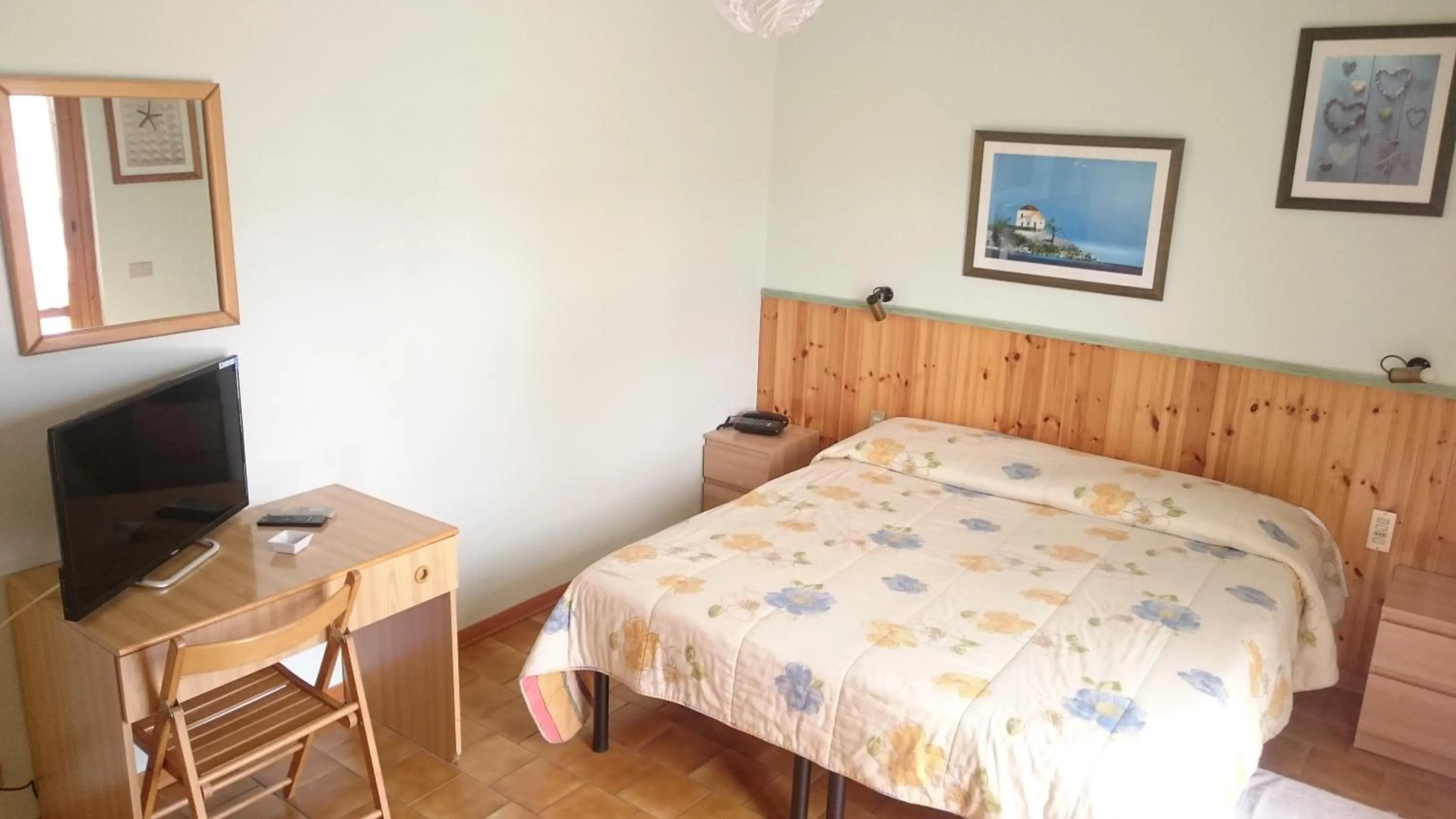 Bed in Albergo Le Rose