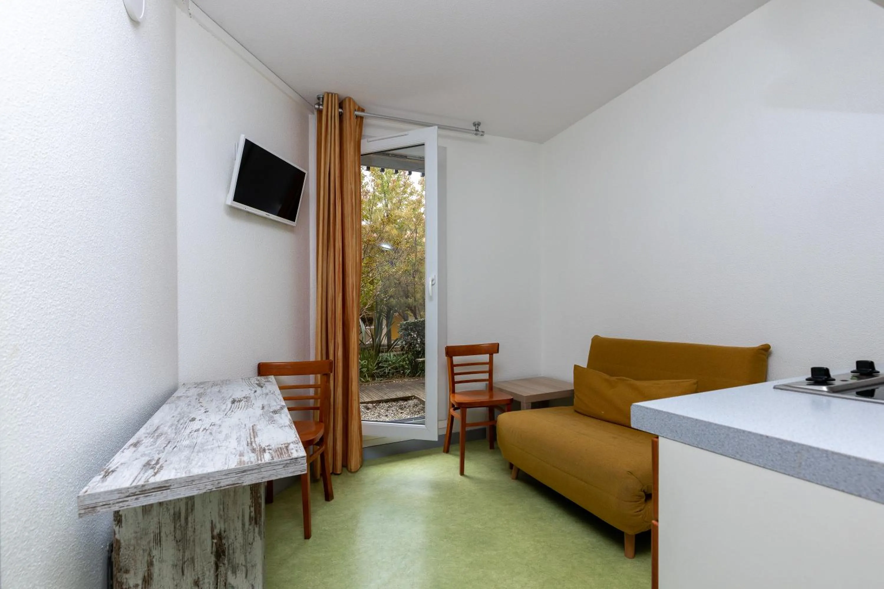 Seating area in Village Vacances Le Junka