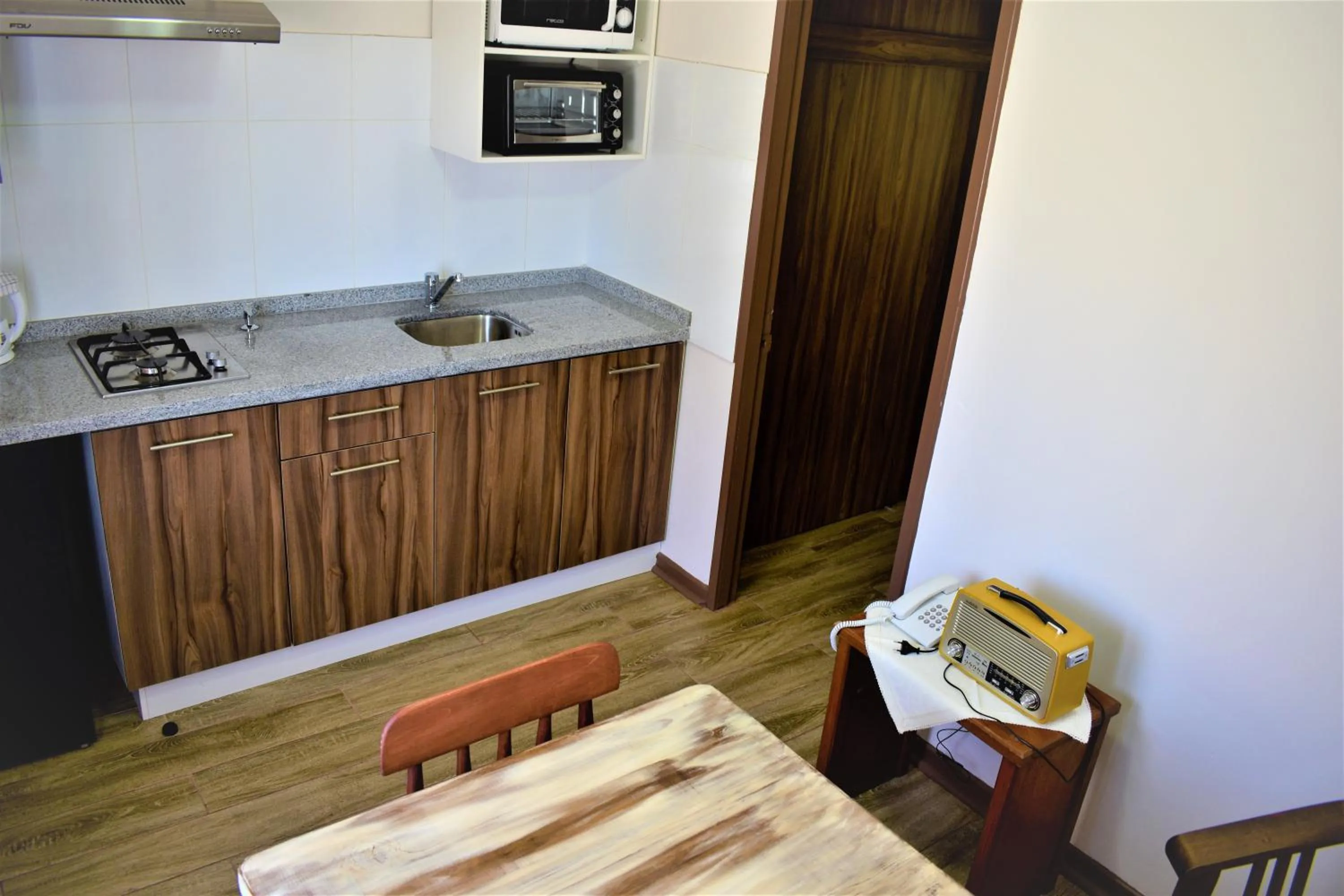 Kitchen or kitchenette in Apart Hotel Y Cabanas Vegasur
