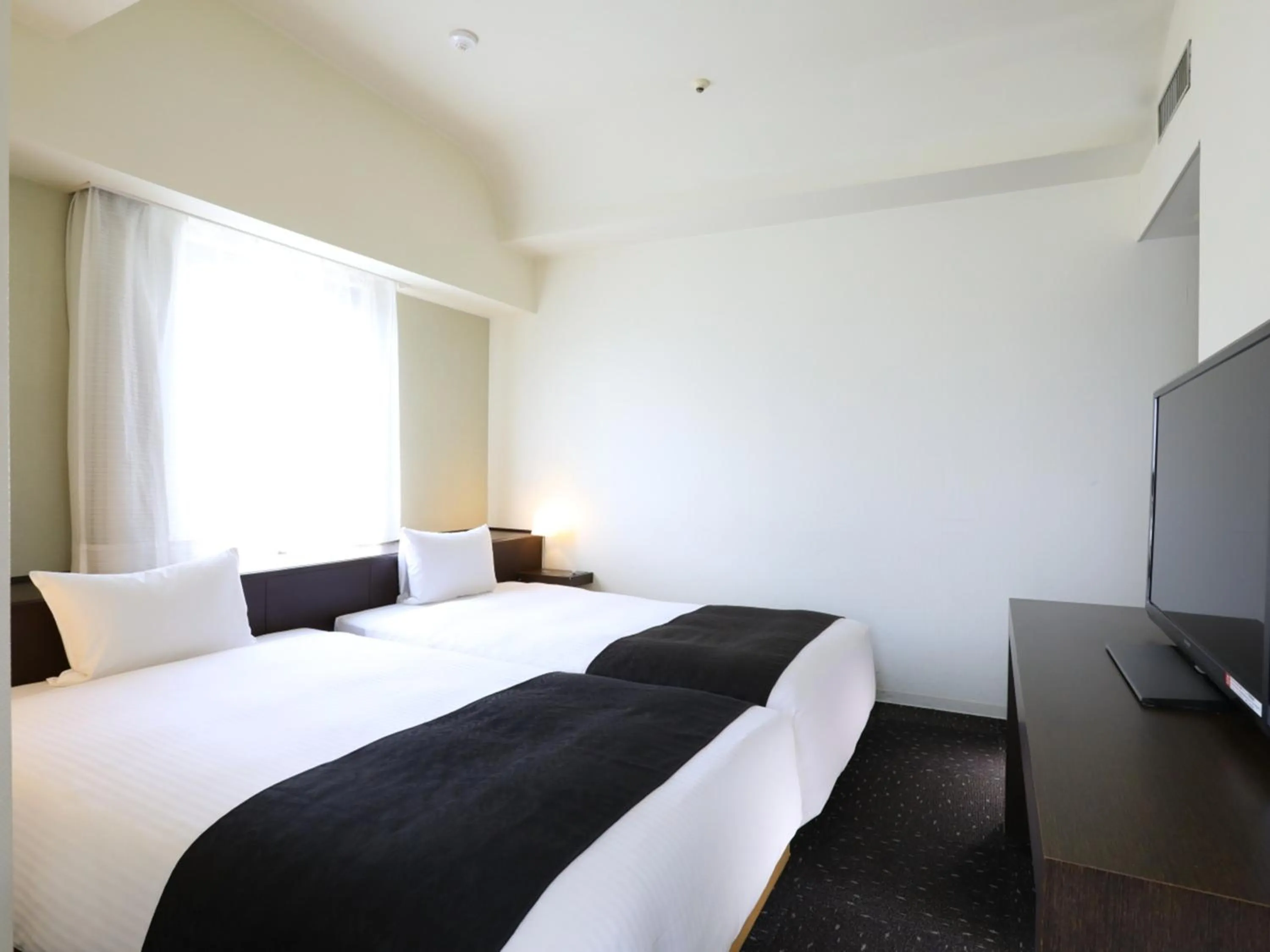 Photo of the whole room, Bed in APA Hotel Sagamihara Hashimoto Ekimae
