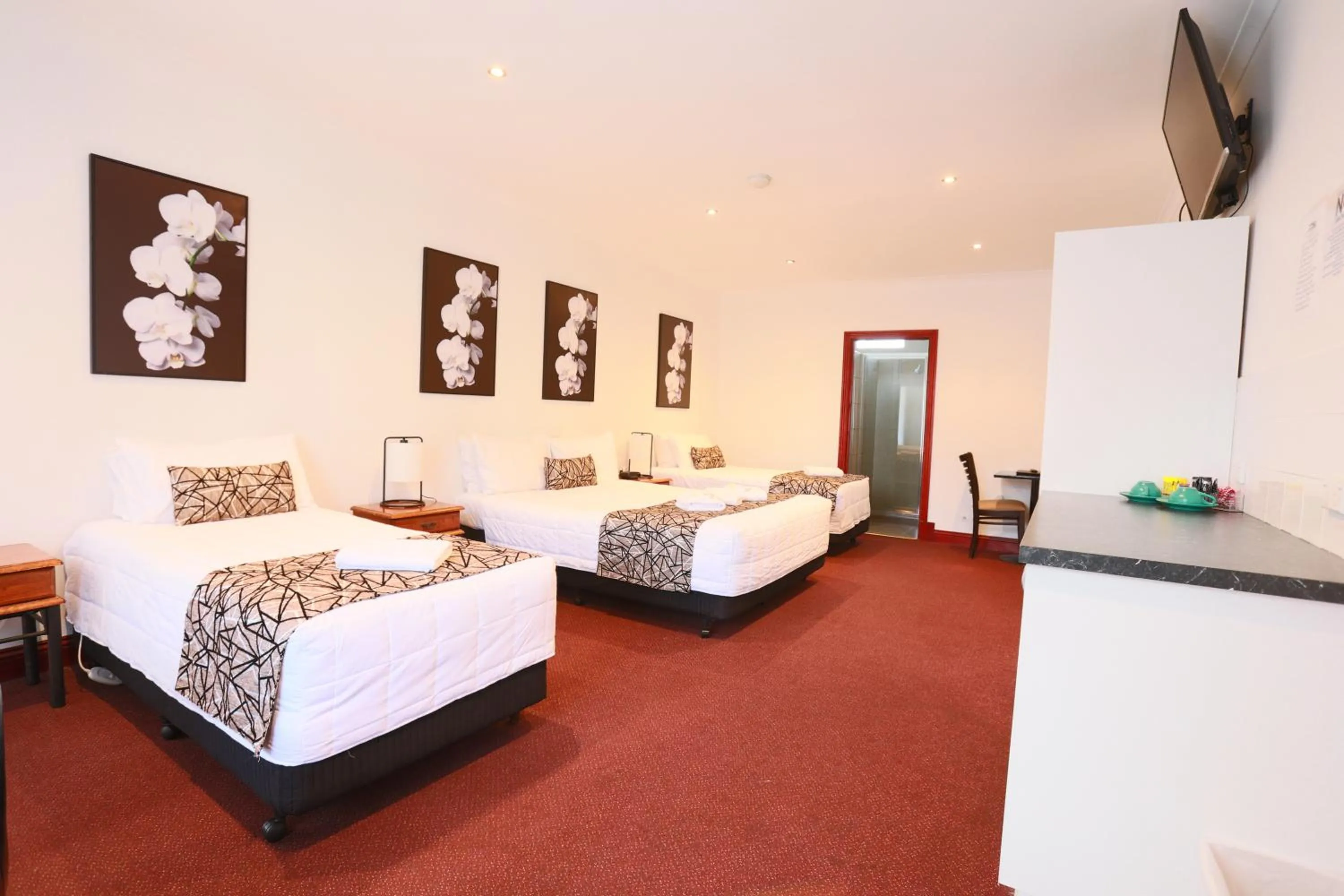 Bed in The Esplanade Motel