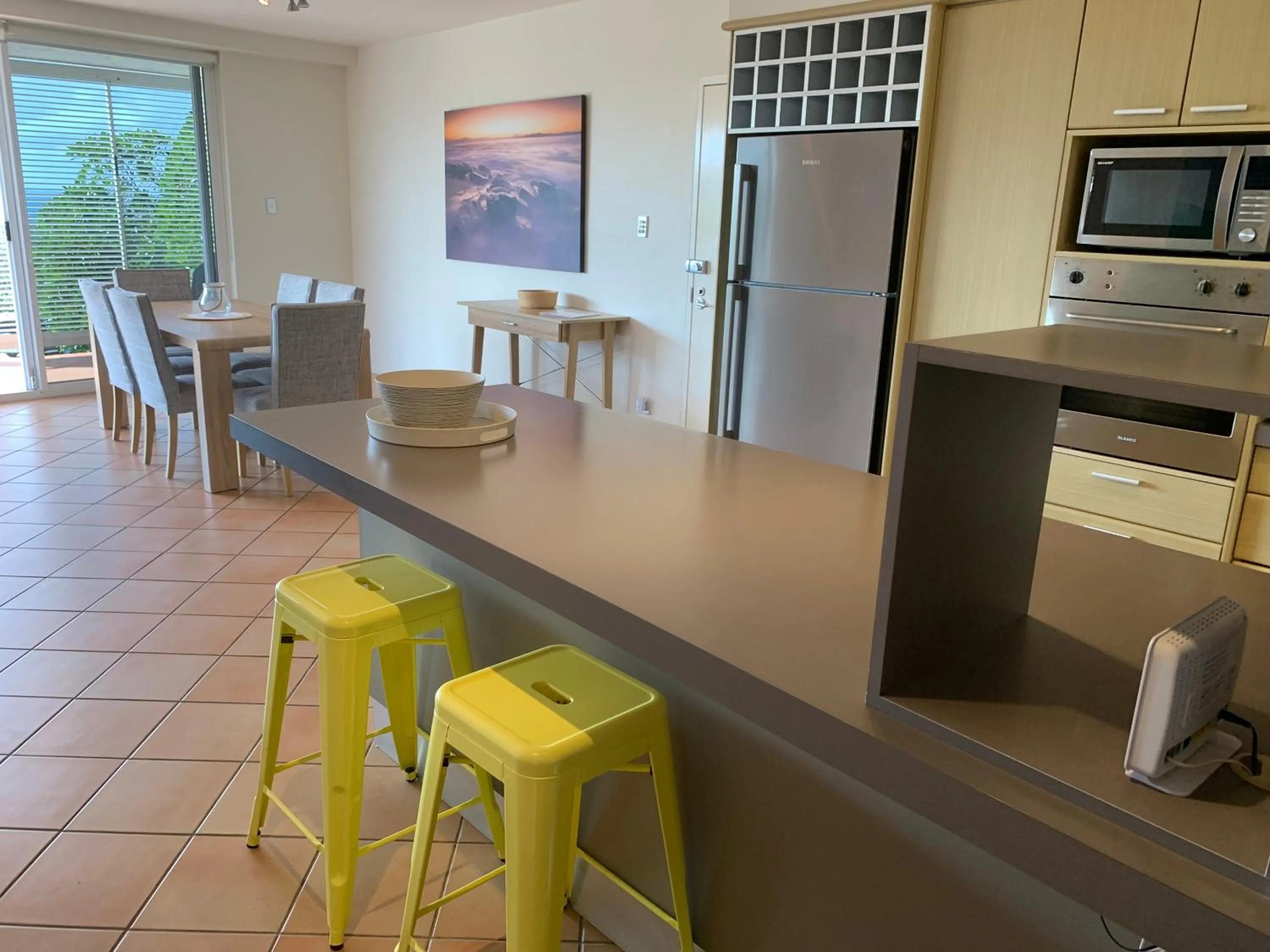Kitchen or kitchenette in Aqua Promenade Beachfront Holiday Apartments