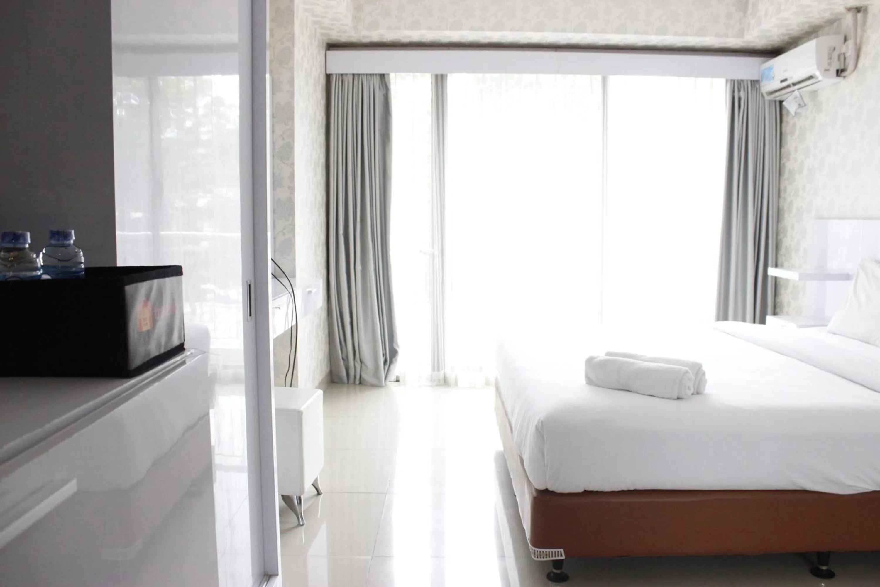 Bed in Relaxing Studio near ITB at Beverly Dago Apartment By Travelio