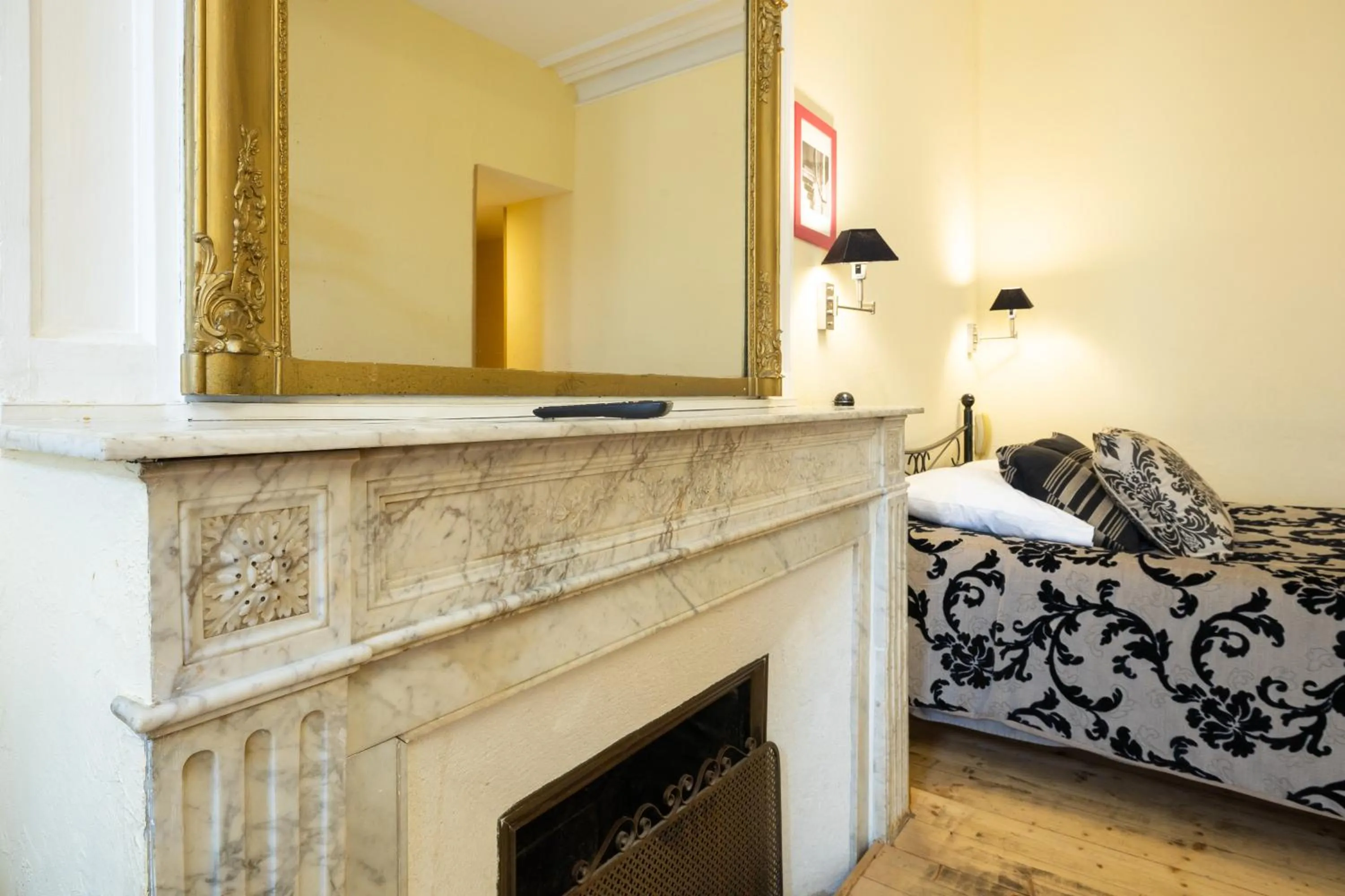 Living room, Bed in Hotel de La Paix