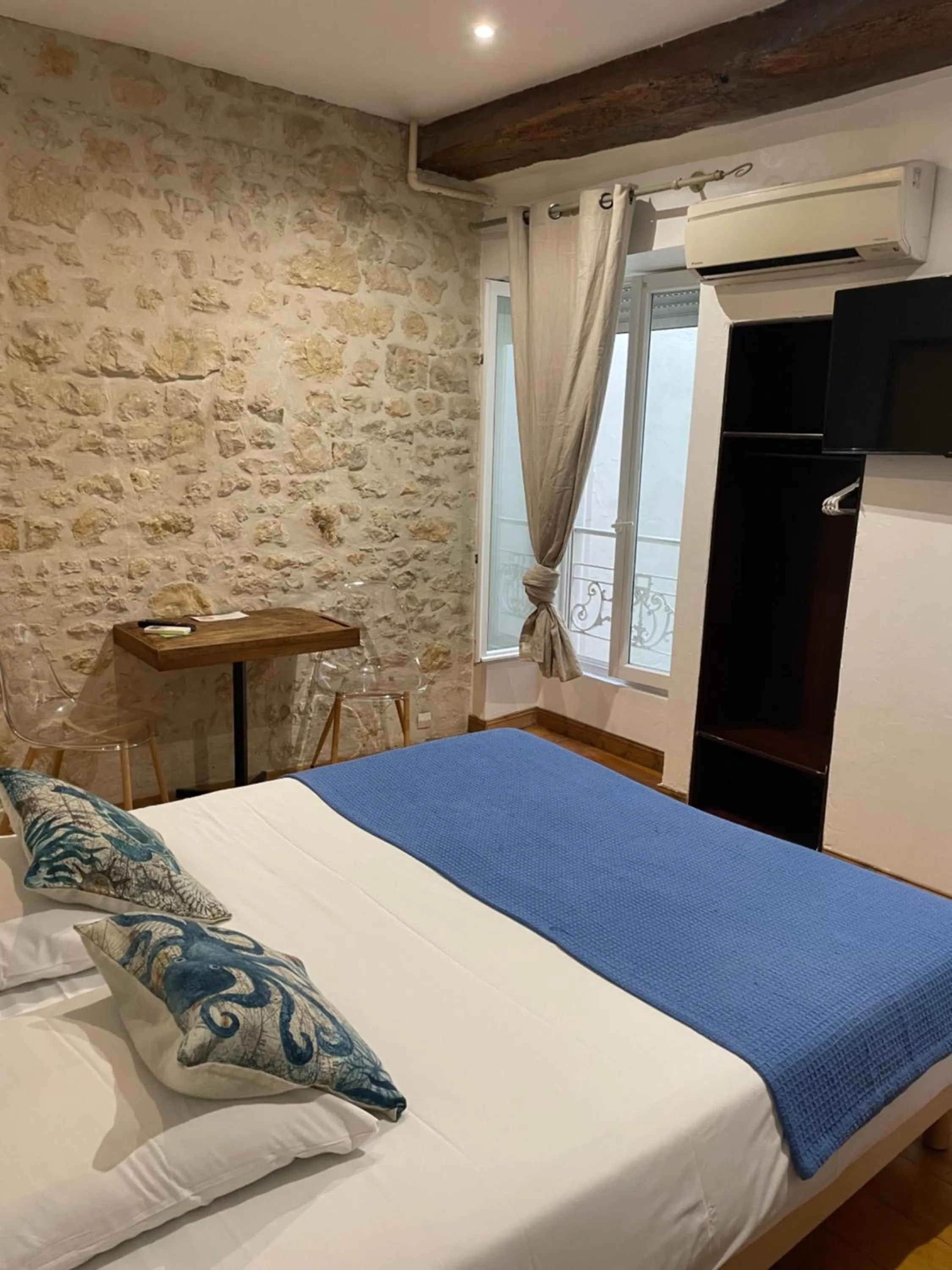 Bed in Hotel de La Paix