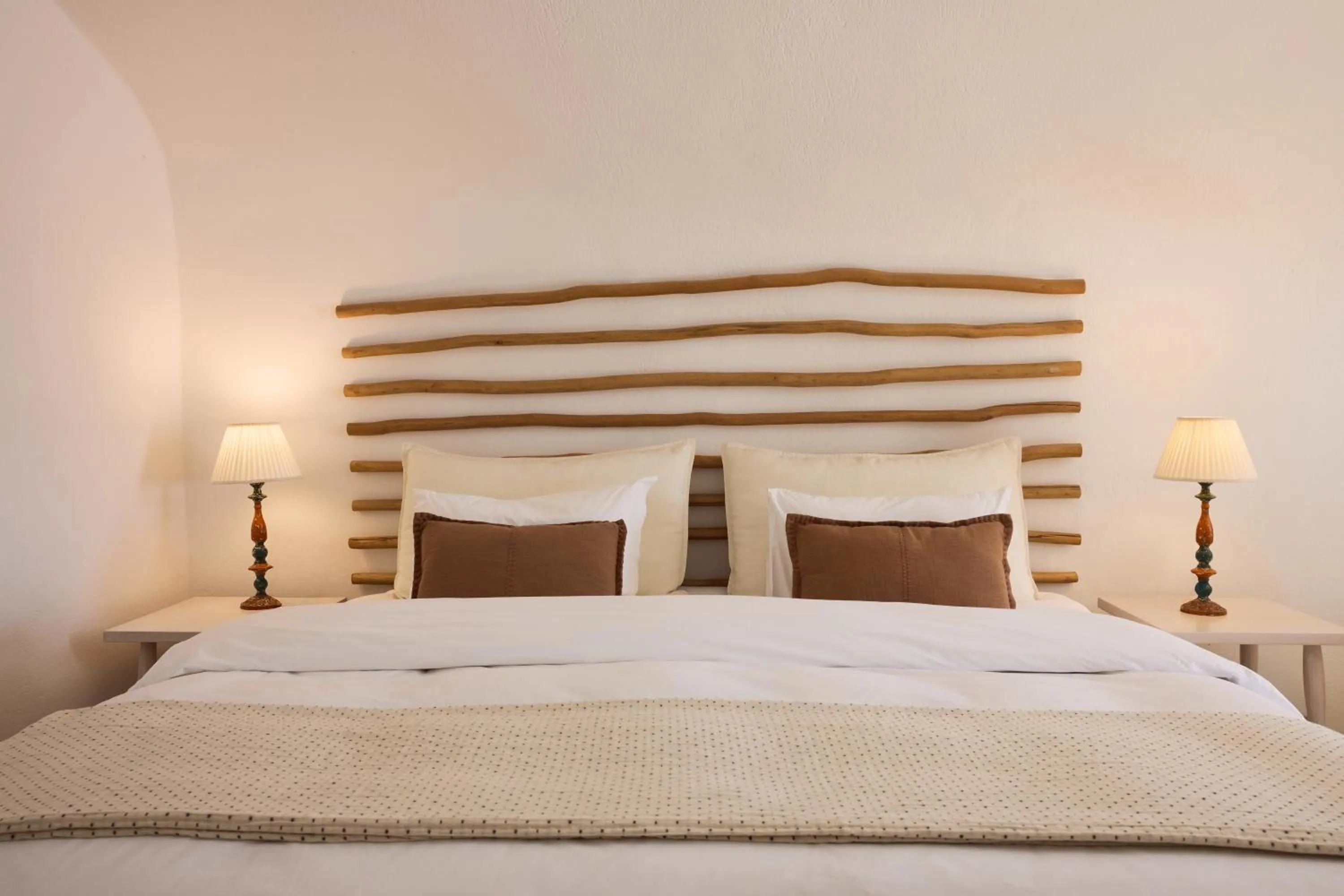 Bed in Iconic Santorini, a Boutique Cave Hotel by Sandglass