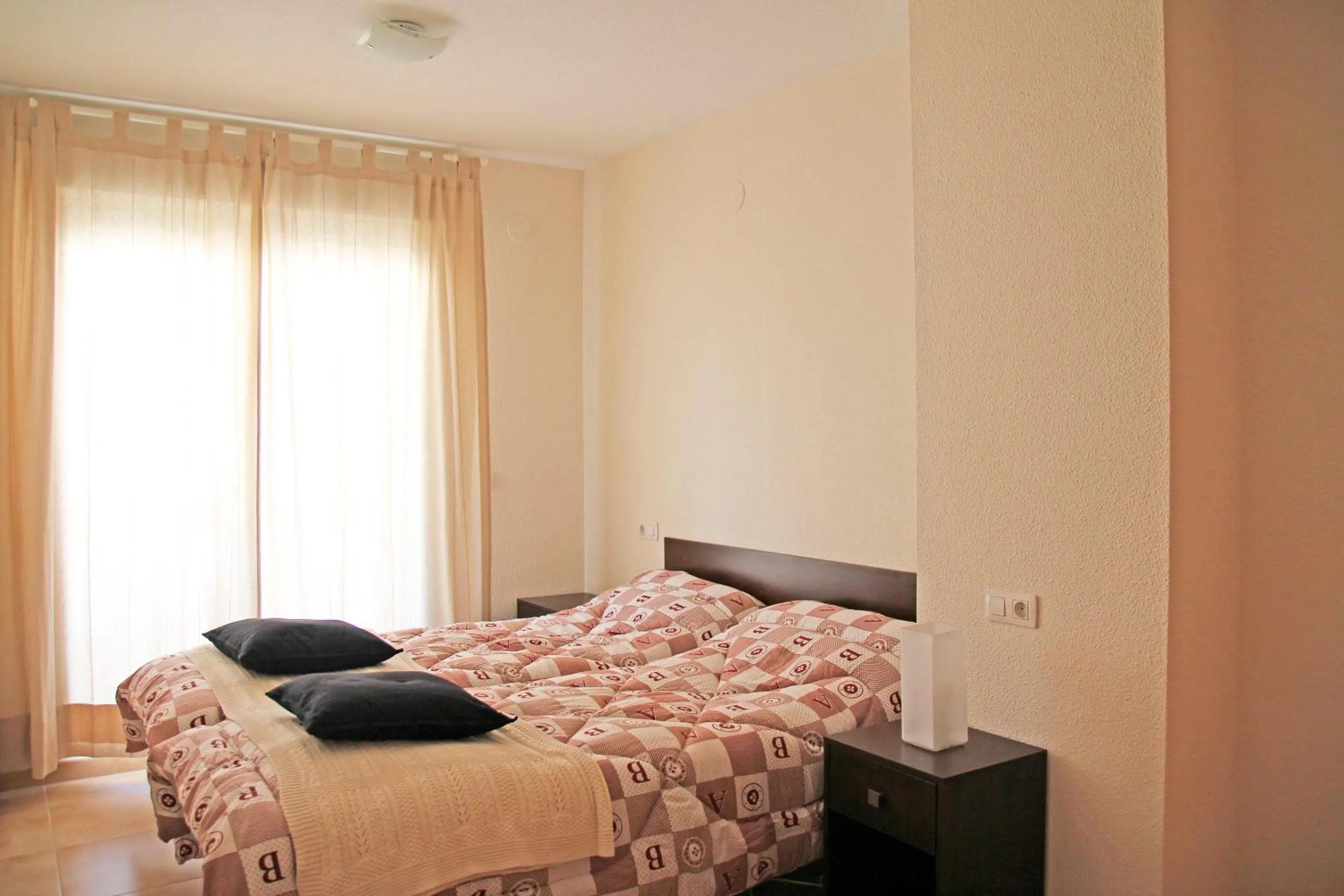 Bedroom, Bed in Apartamentos Doña Carmen 3000