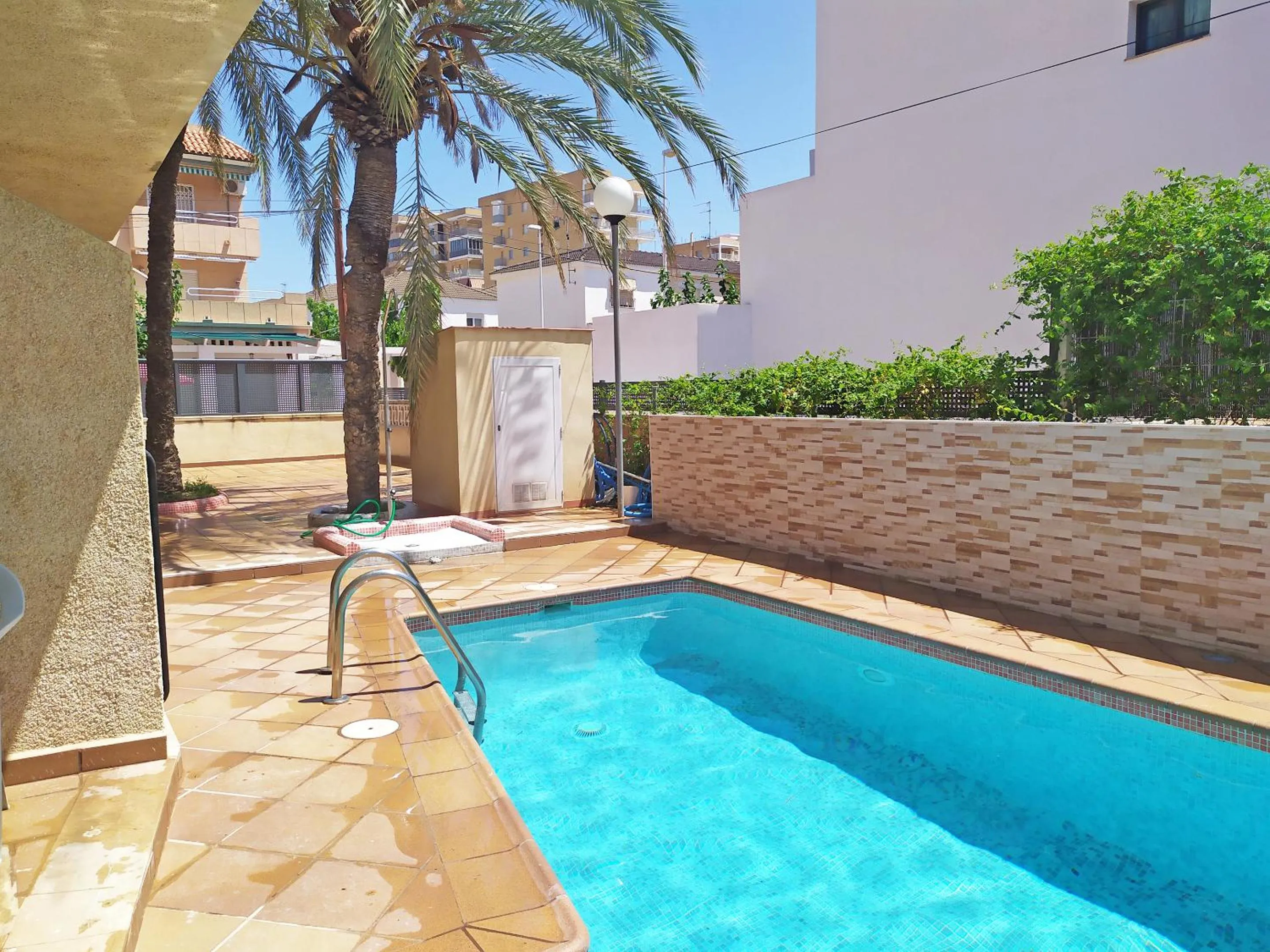 Swimming pool in Apartamentos Doña Carmen 3000