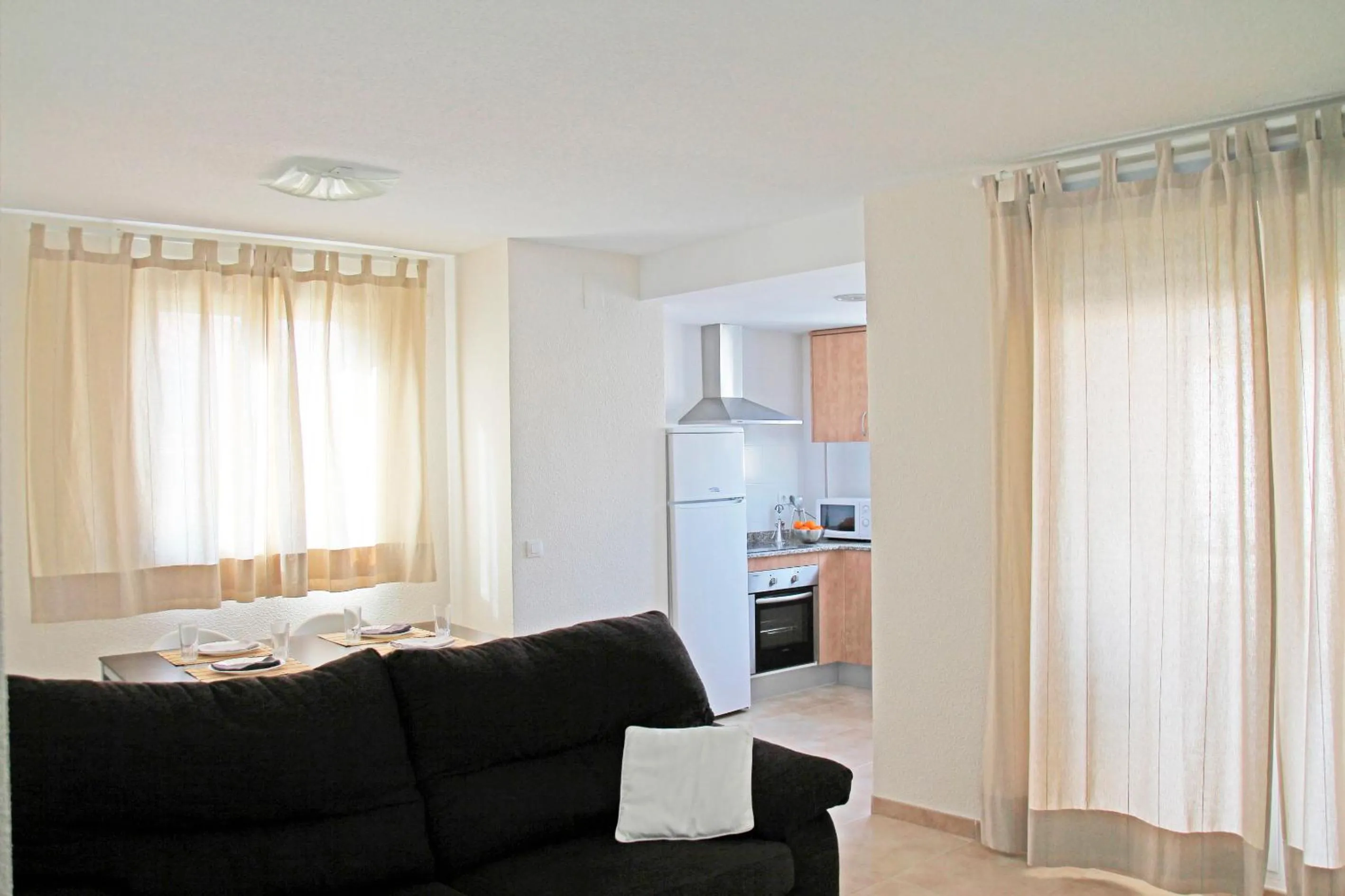 Communal lounge/ TV room in Apartamentos Doña Carmen 3000