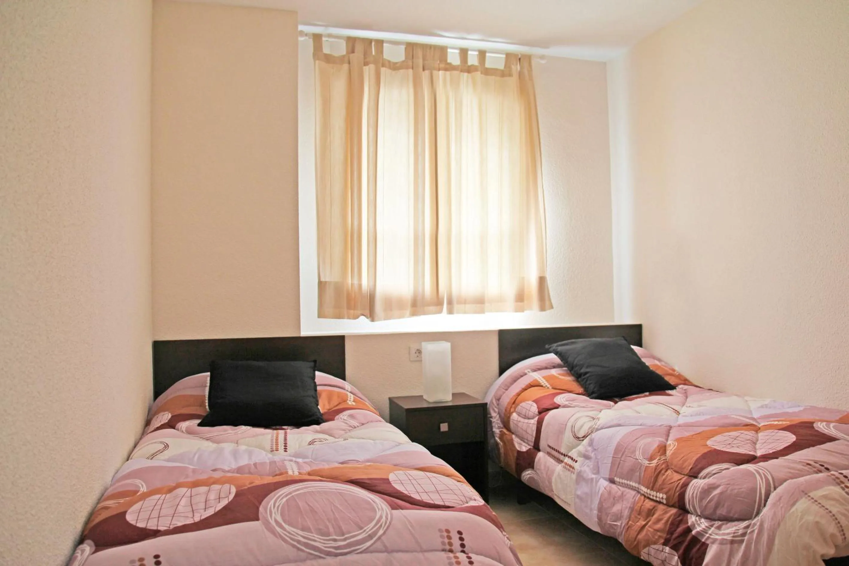 Bedroom, Bed in Apartamentos Doña Carmen 3000