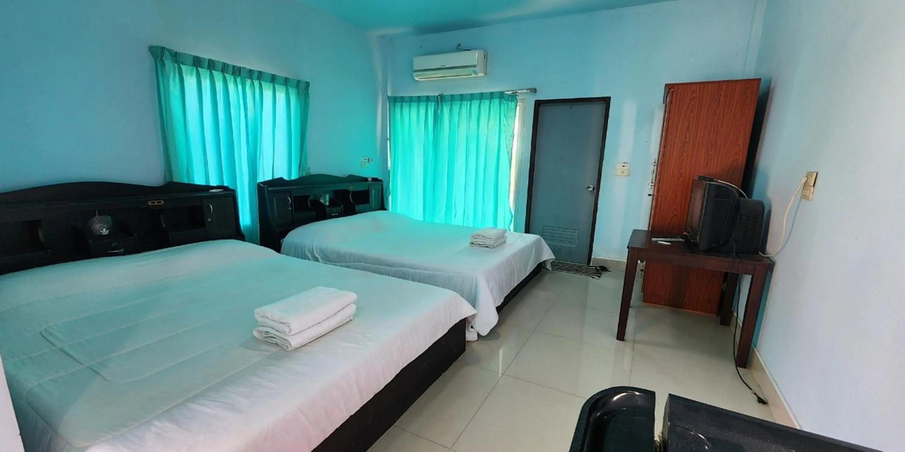 Bed in Chok Phikul Thong Resort