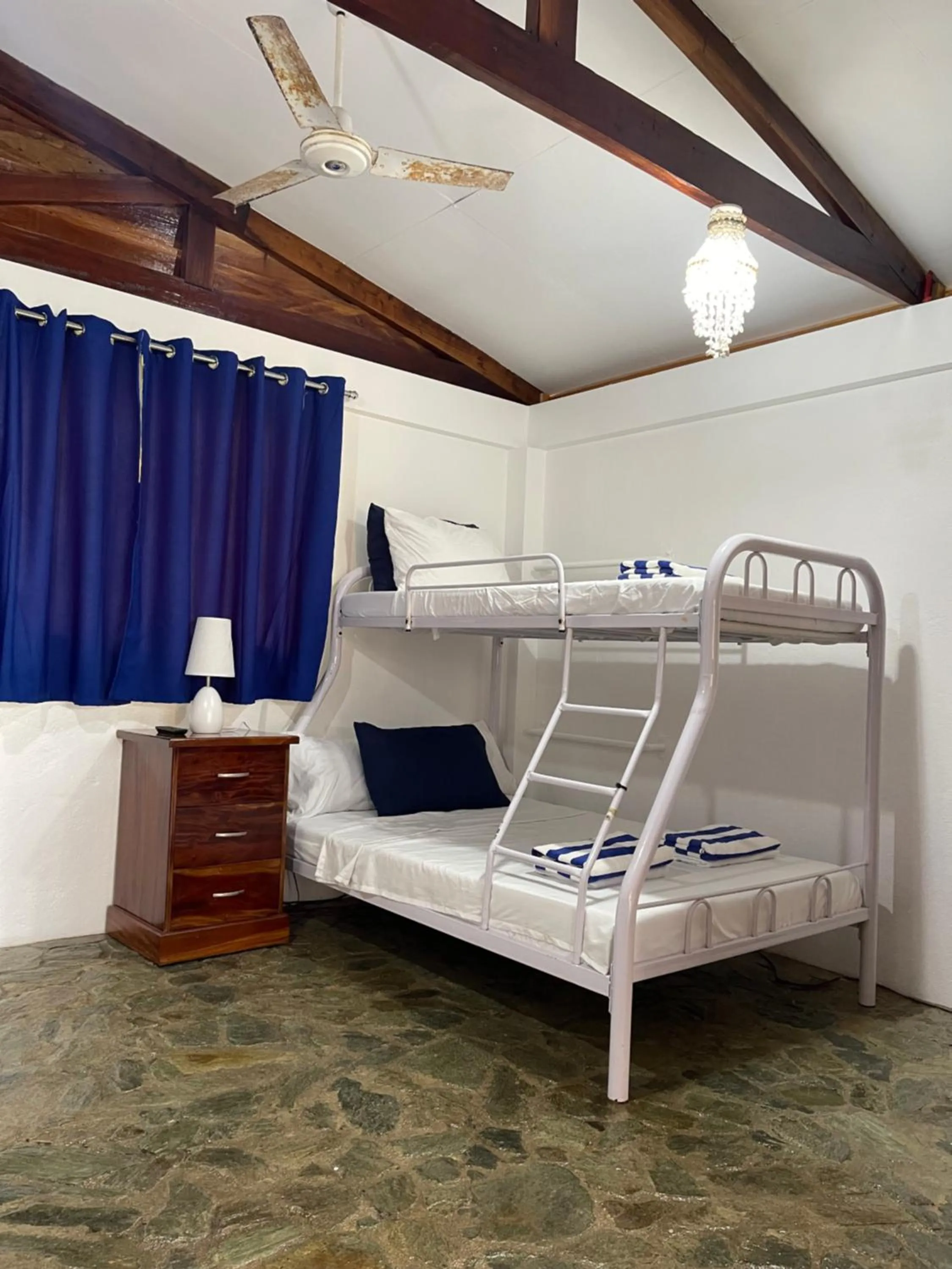 Bed in Rainbow Bay Beach & Dive Resort