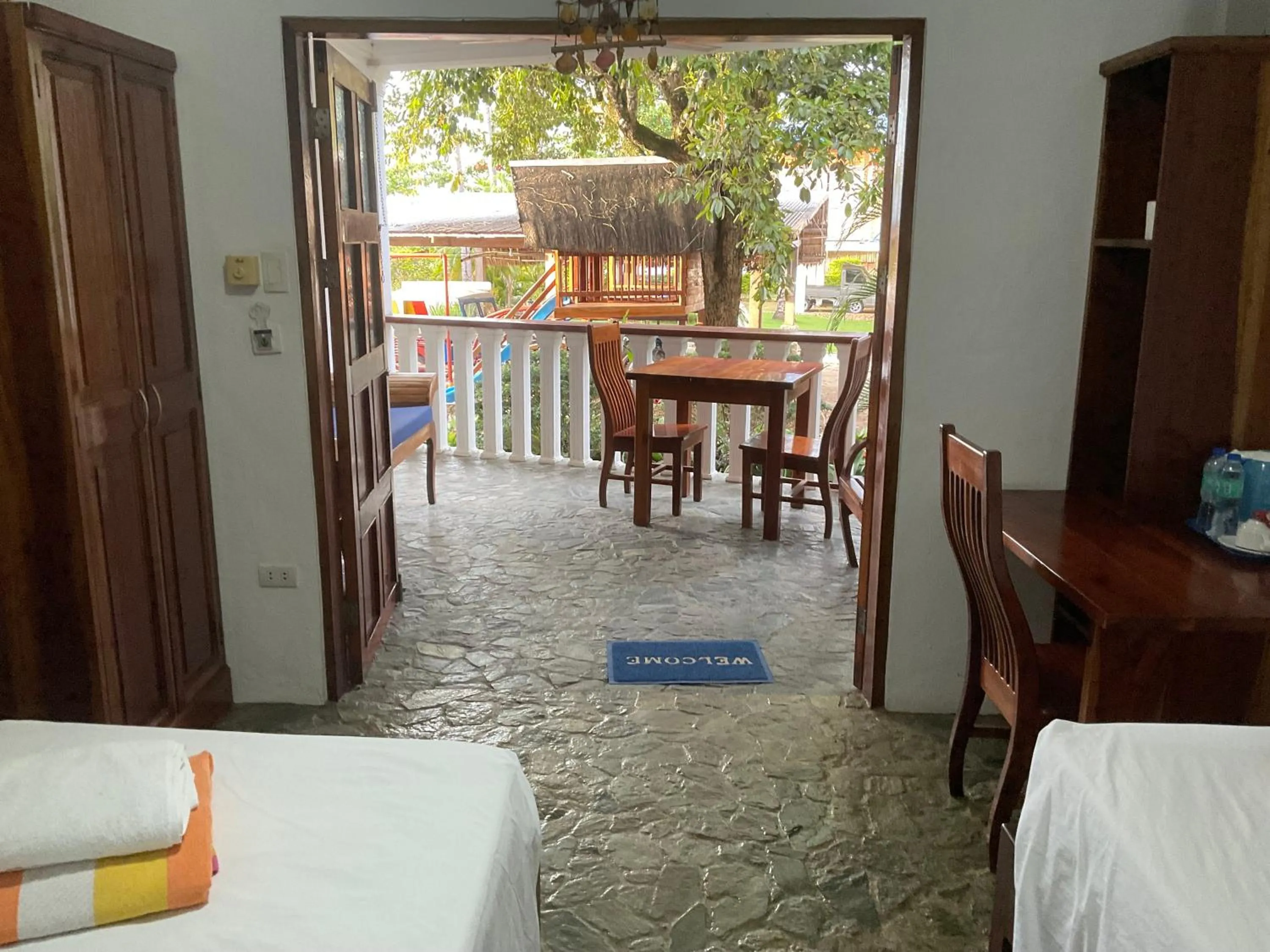 Bed in Rainbow Bay Beach & Dive Resort