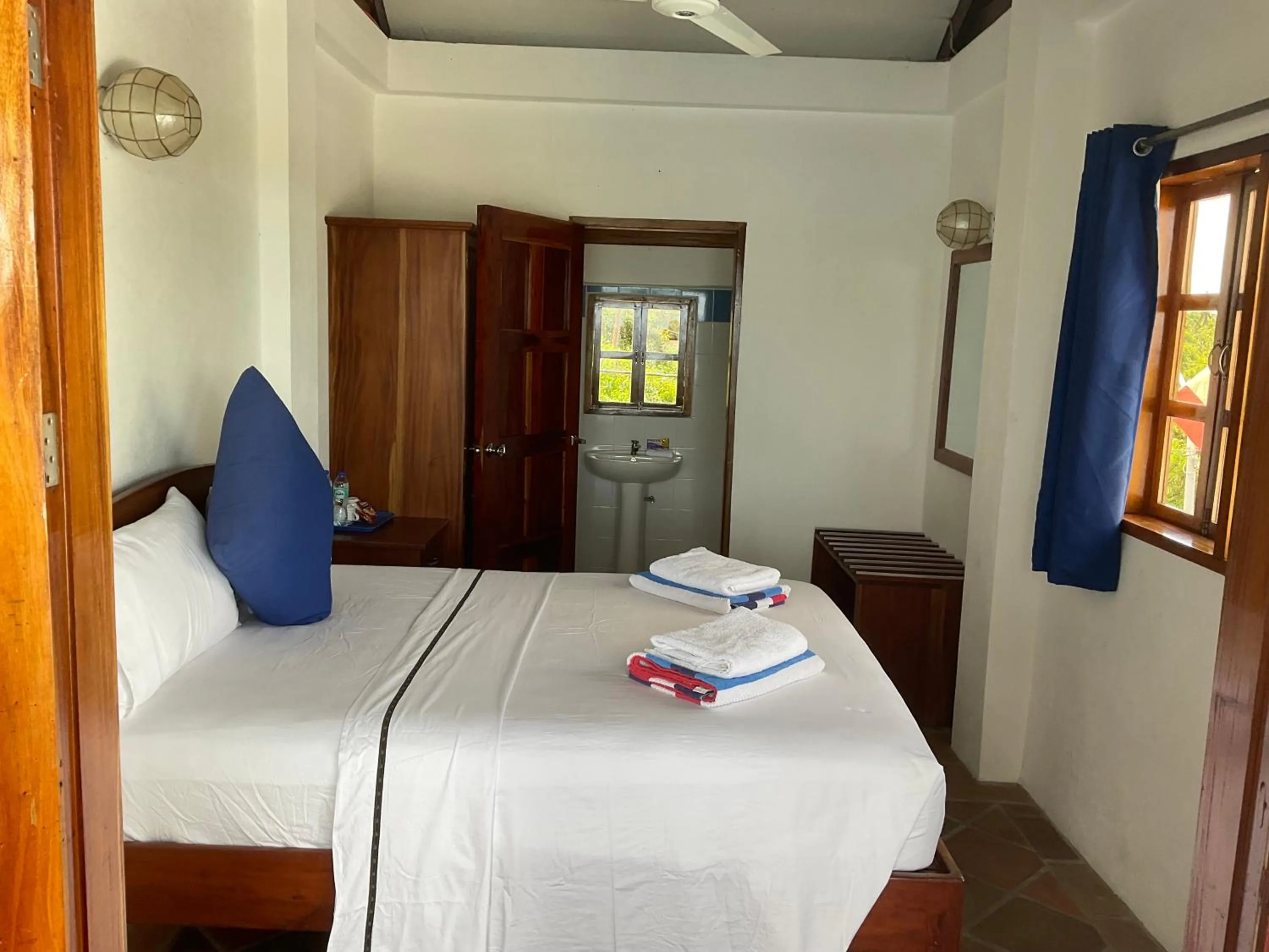 Bed in Rainbow Bay Beach & Dive Resort