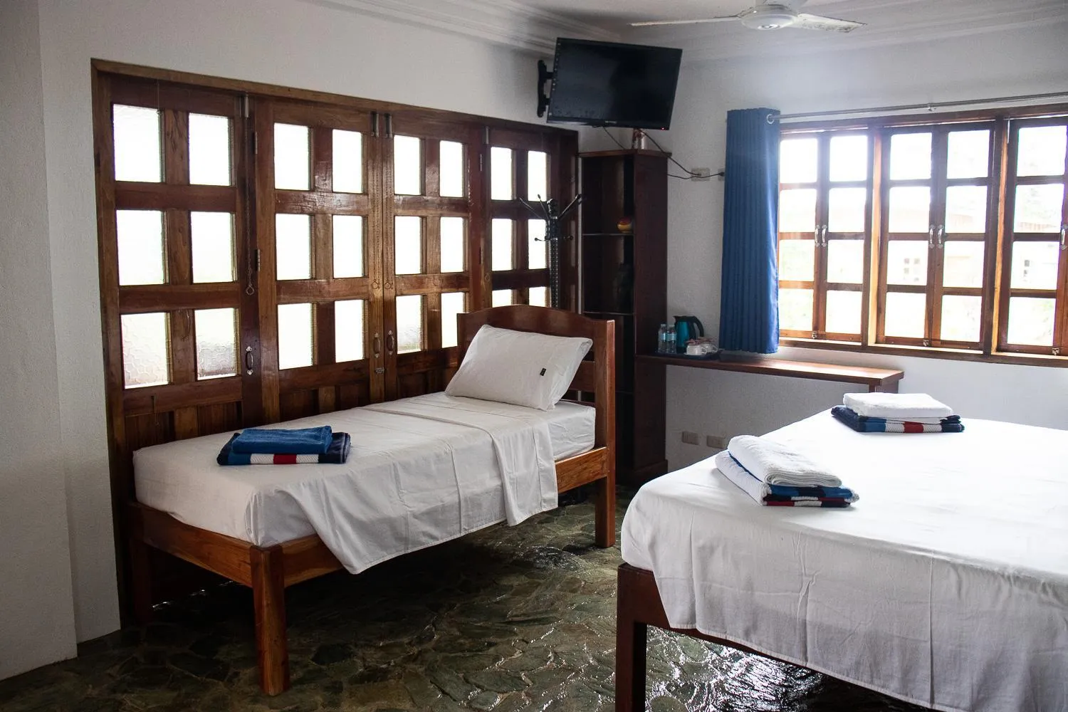 Bed in Rainbow Bay Beach & Dive Resort