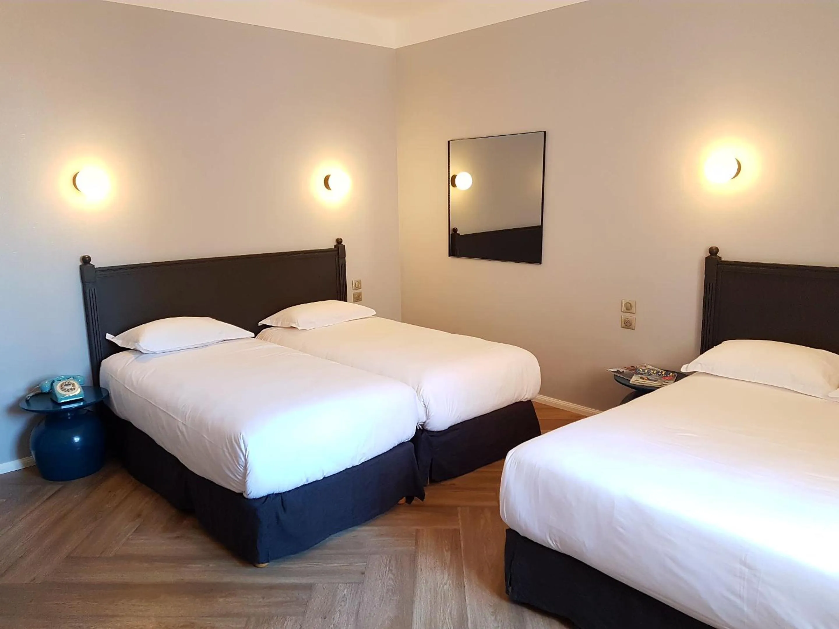 Photo of the whole room, Bed in Hôtel L'orque Bleue