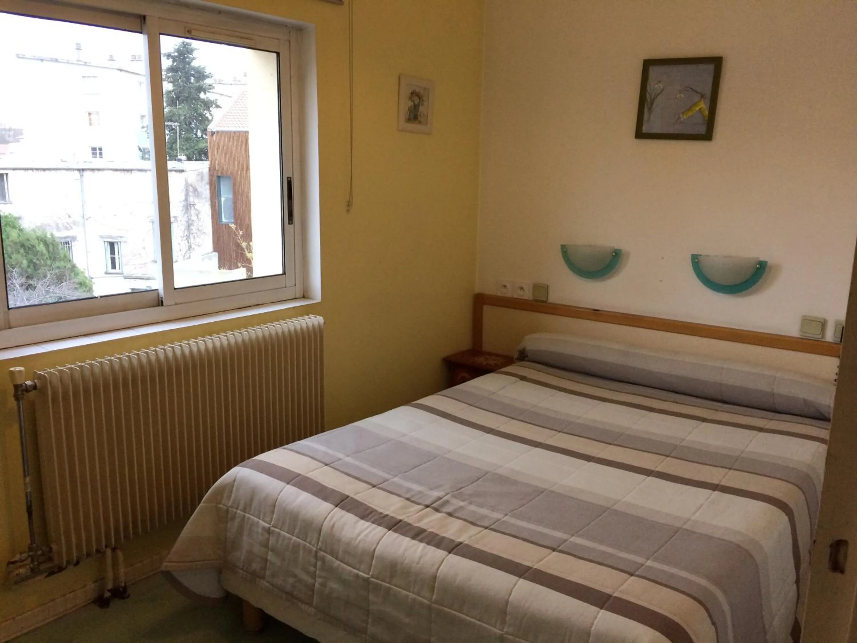 Garden view, Bed in Hotel Acapulco