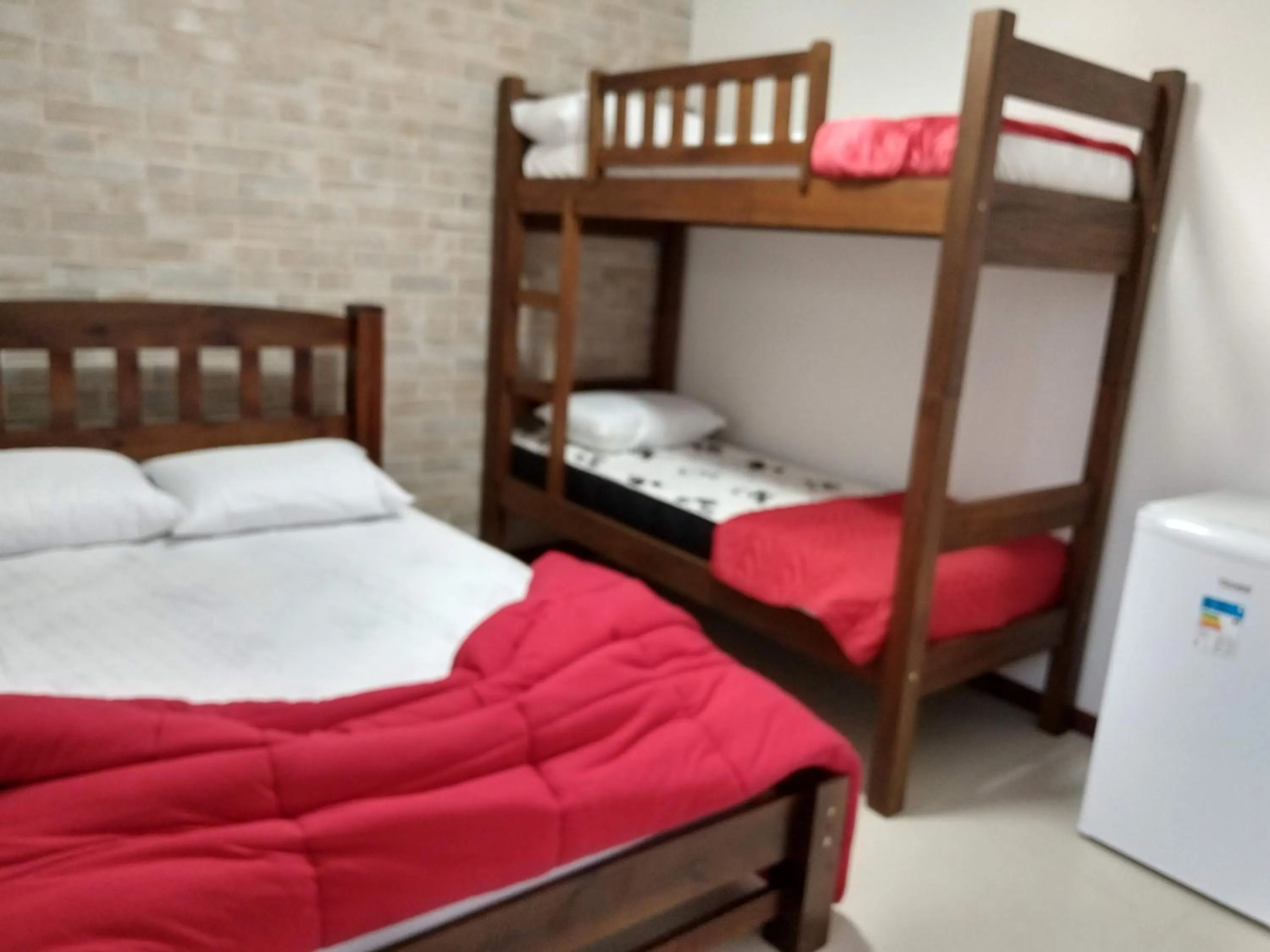 Bed in Pousada Fazendinha Unamar