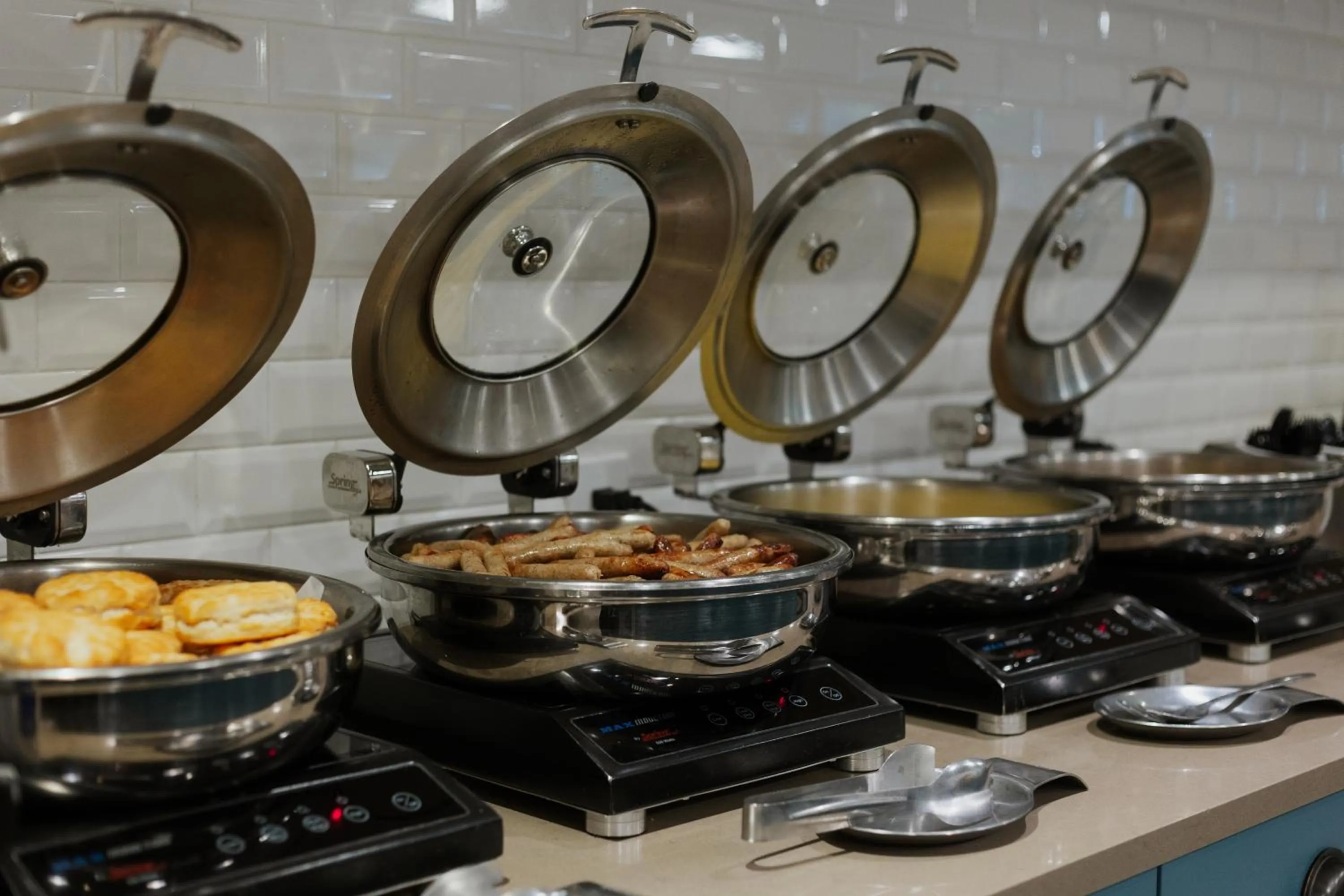 Buffet breakfast in Country Inn & Suites by Radisson, Seattle-Bothell, WA