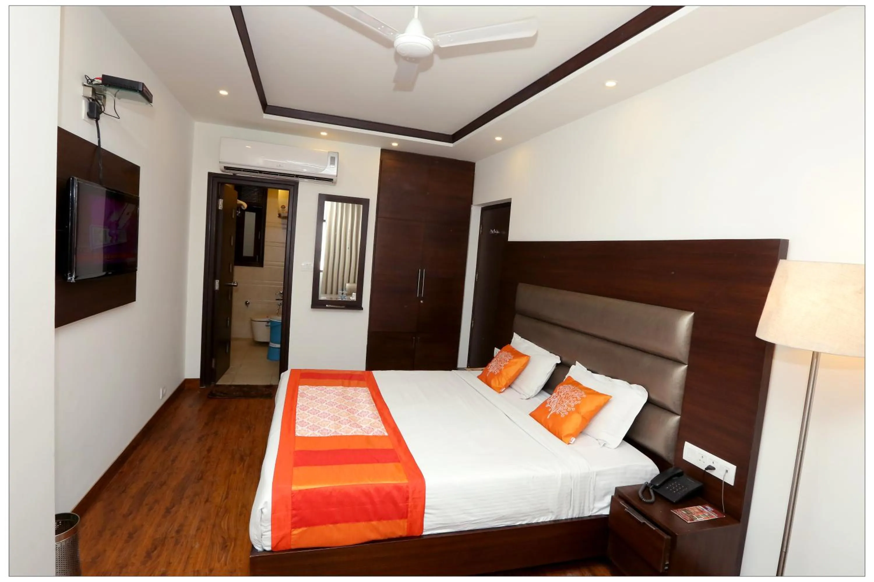 Photo of the whole room, Bed in Hotel The R Blues - Near IGI Airport New Delhi