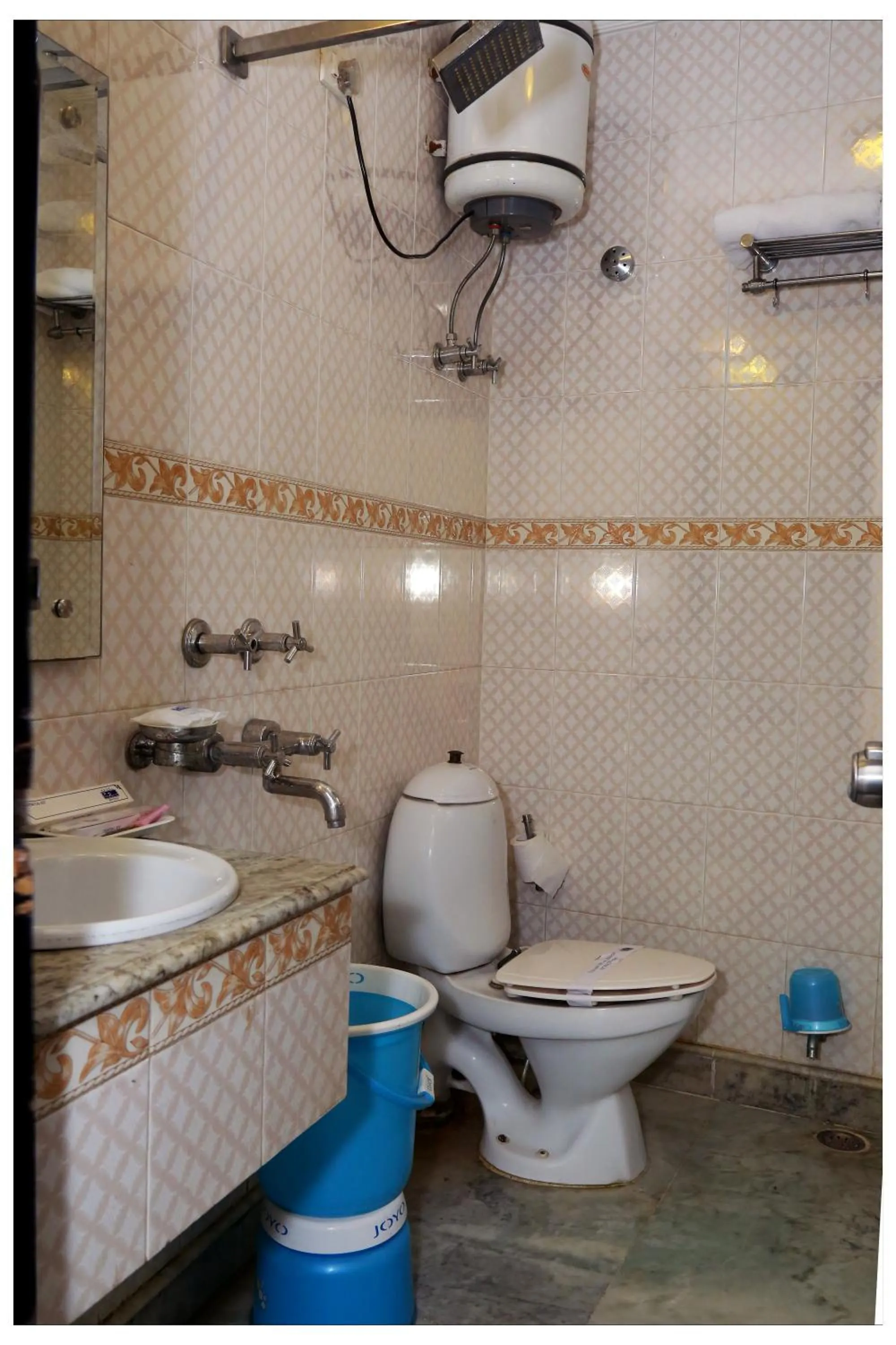 Photo of the whole room in Hotel The R Blues - Near IGI Airport New Delhi