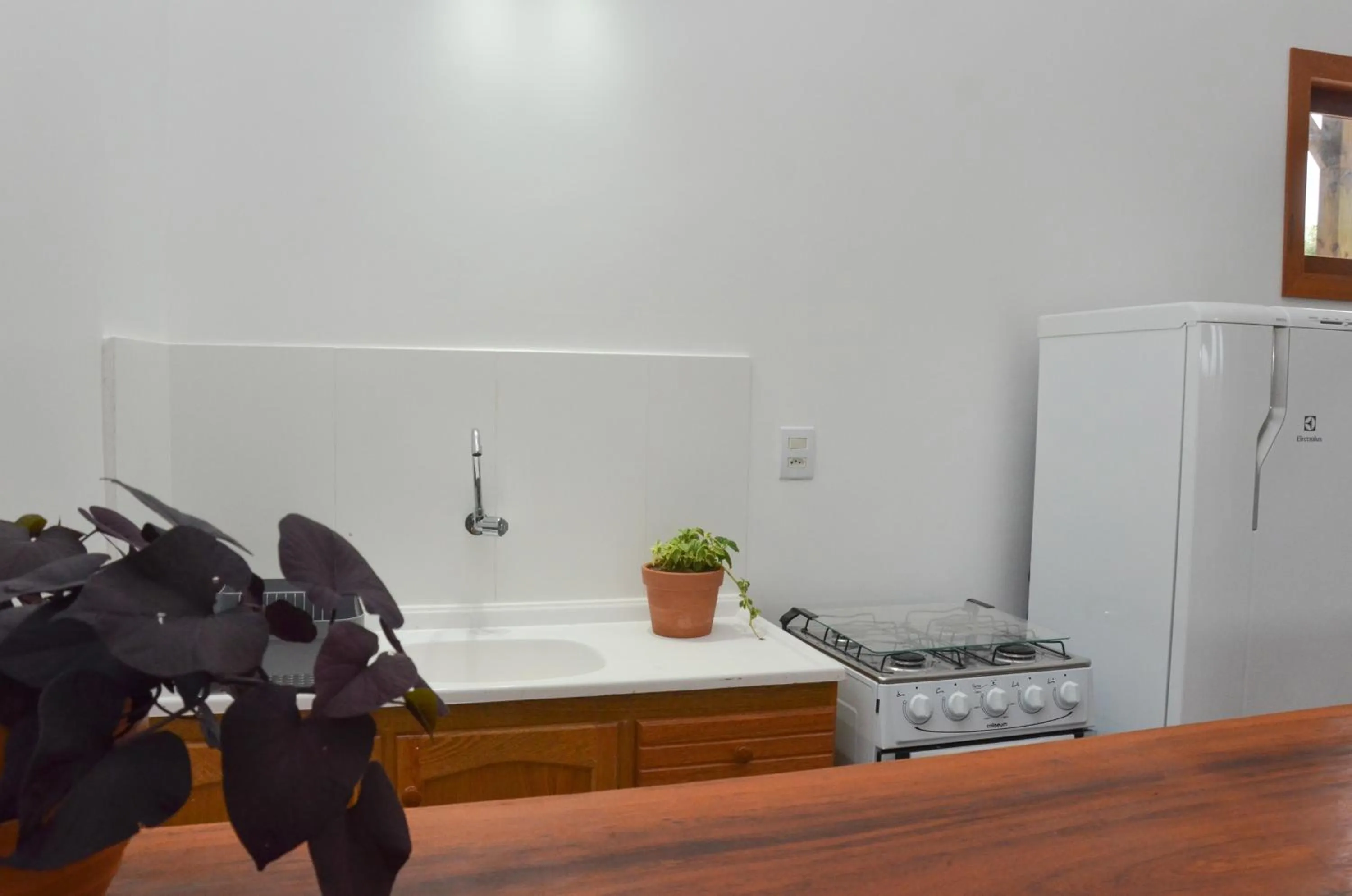 Kitchen or kitchenette in Pousada la Boheme Guarda do Embaú - SC