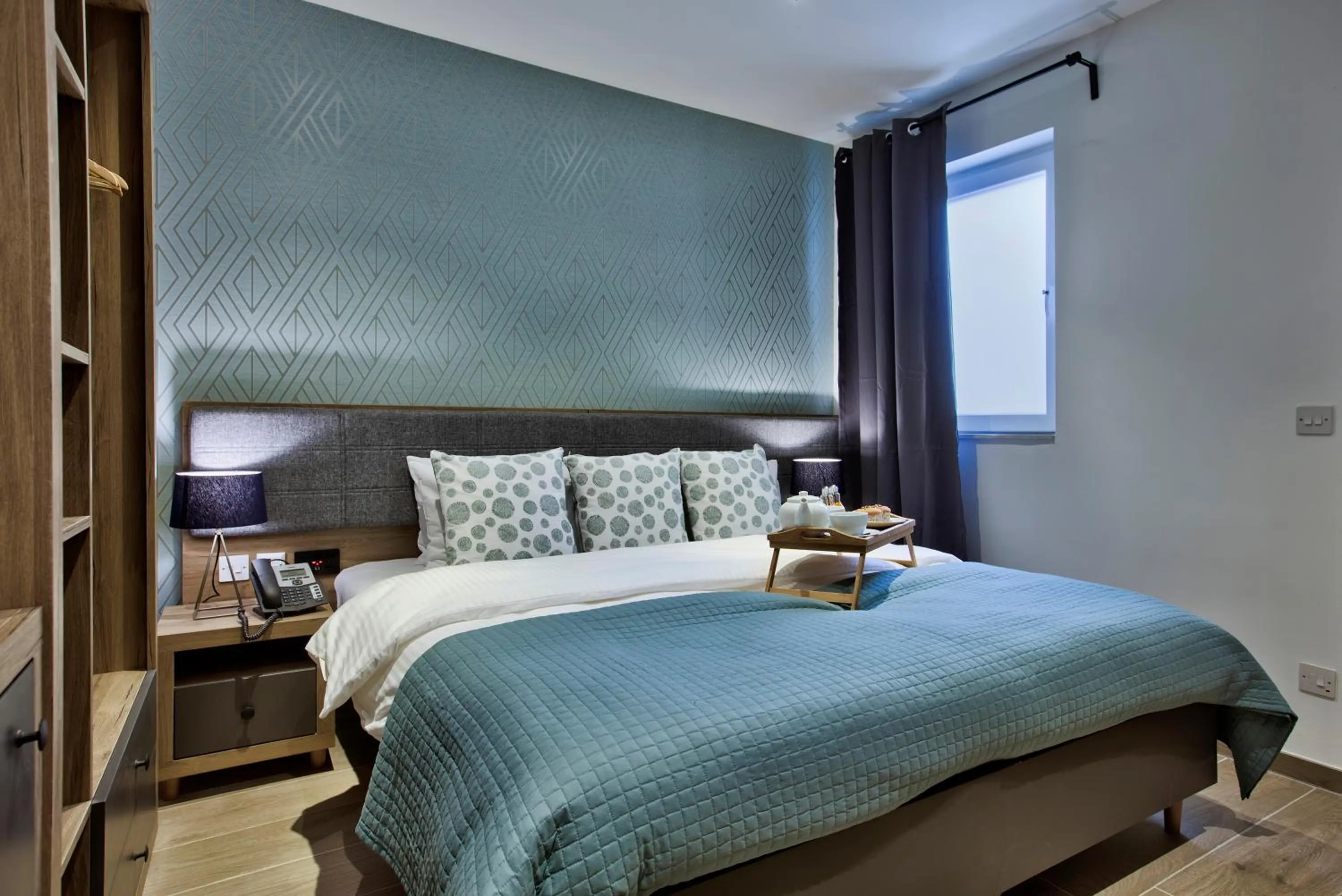 Bed in Tritoni Valletta Boutique Hotel