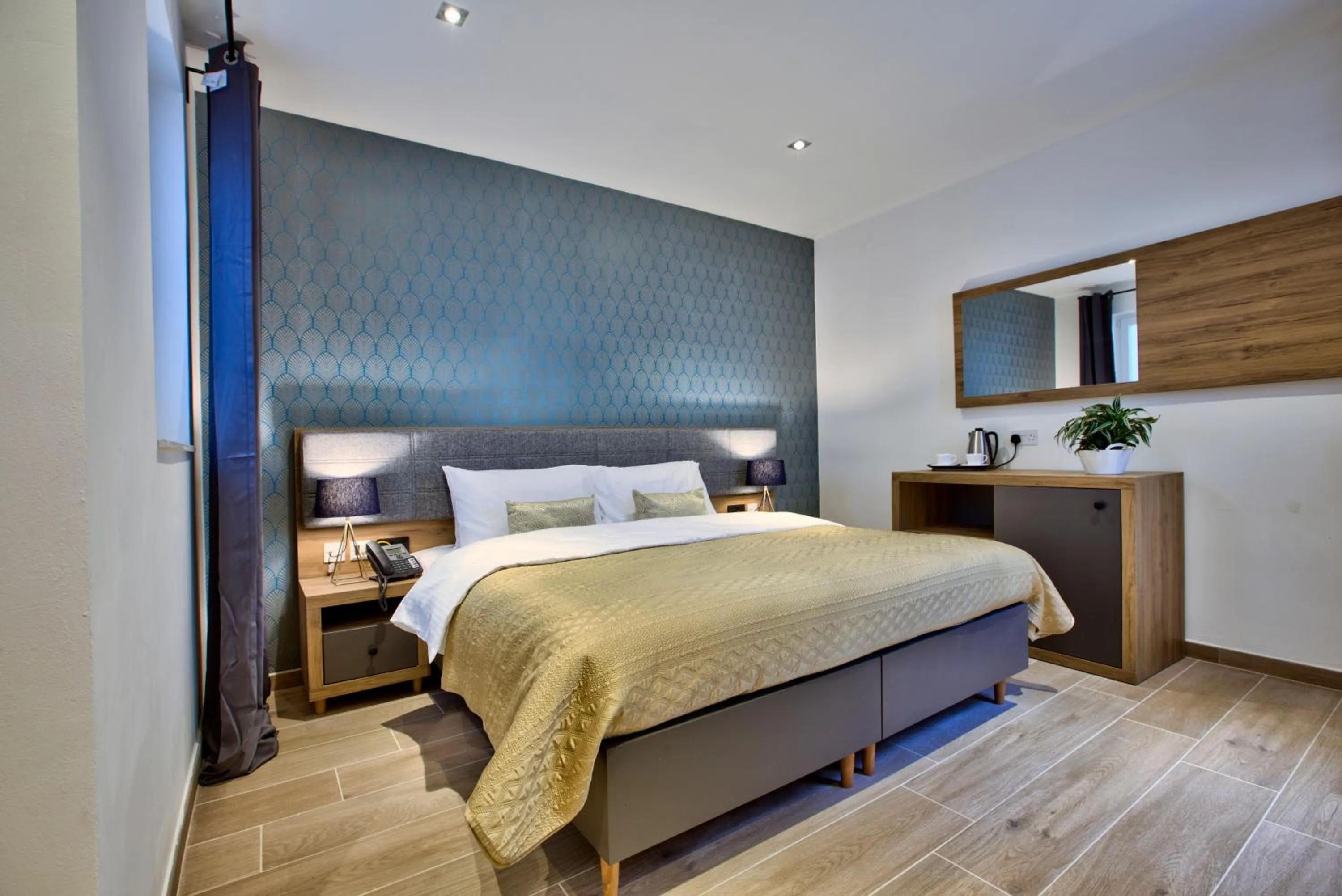 Bed in Tritoni Valletta Boutique Hotel