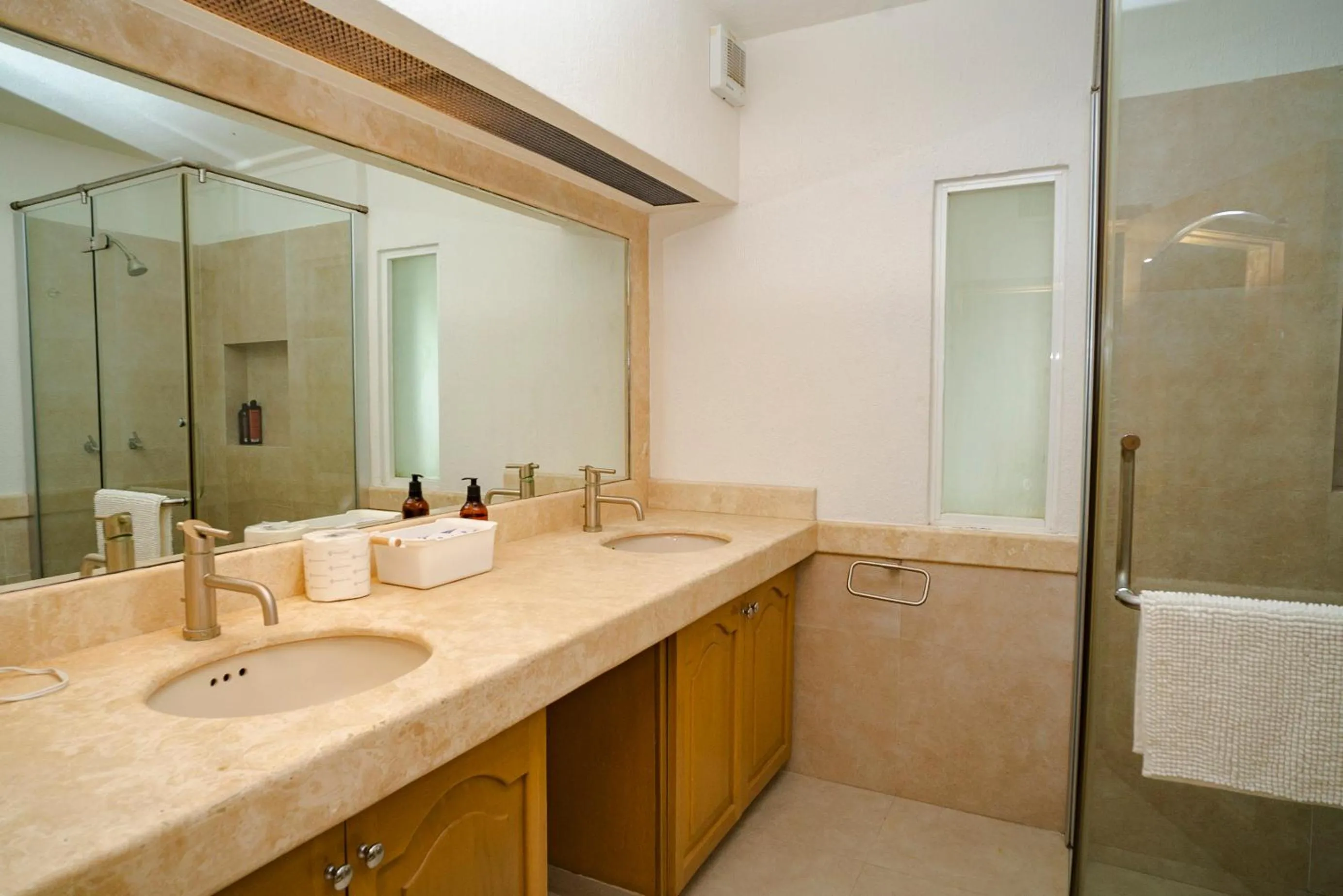 Bathroom in Oceanfront condo at voted best Cancun sandy beach