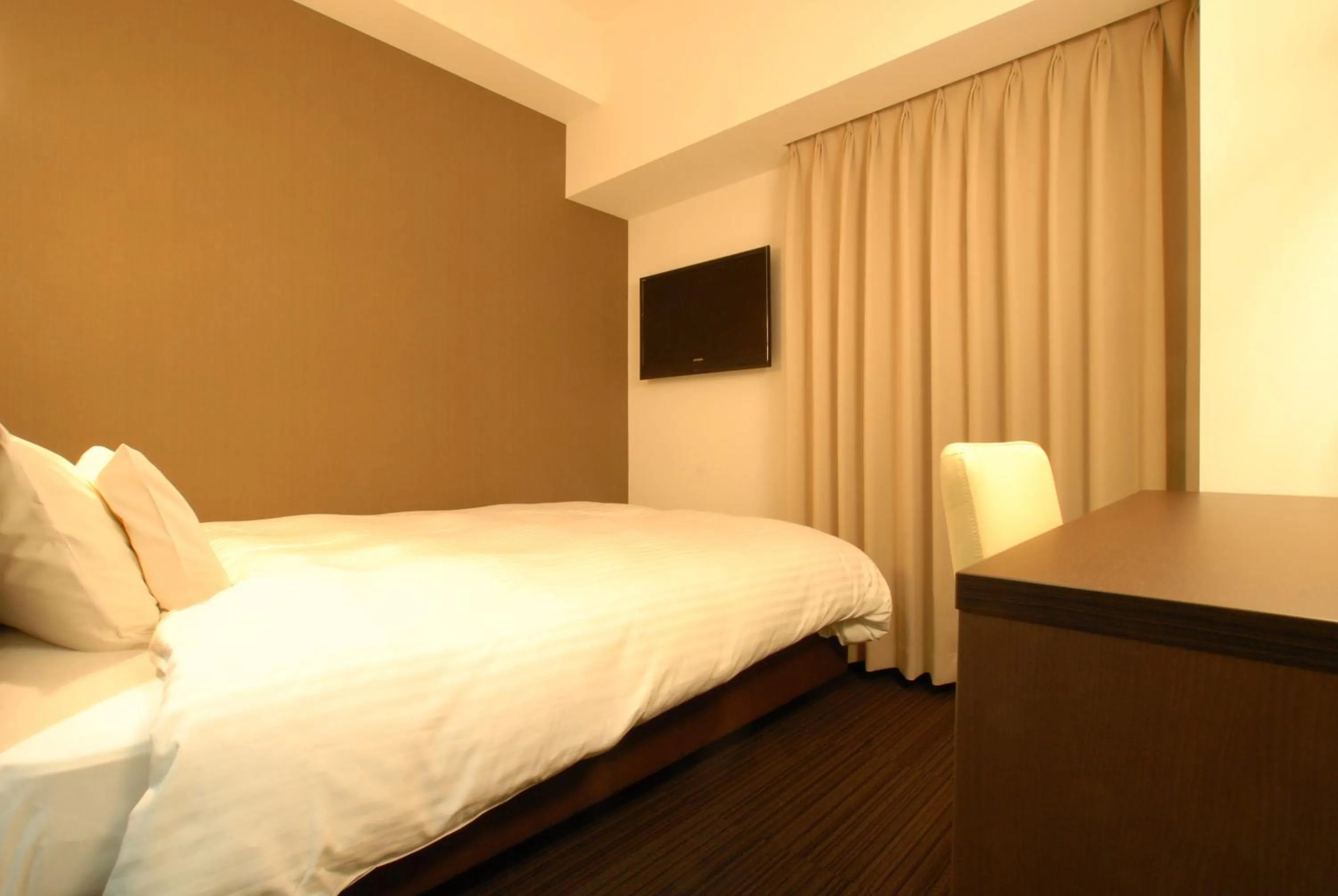 Bed in AB Hotel Nagoya Sakae