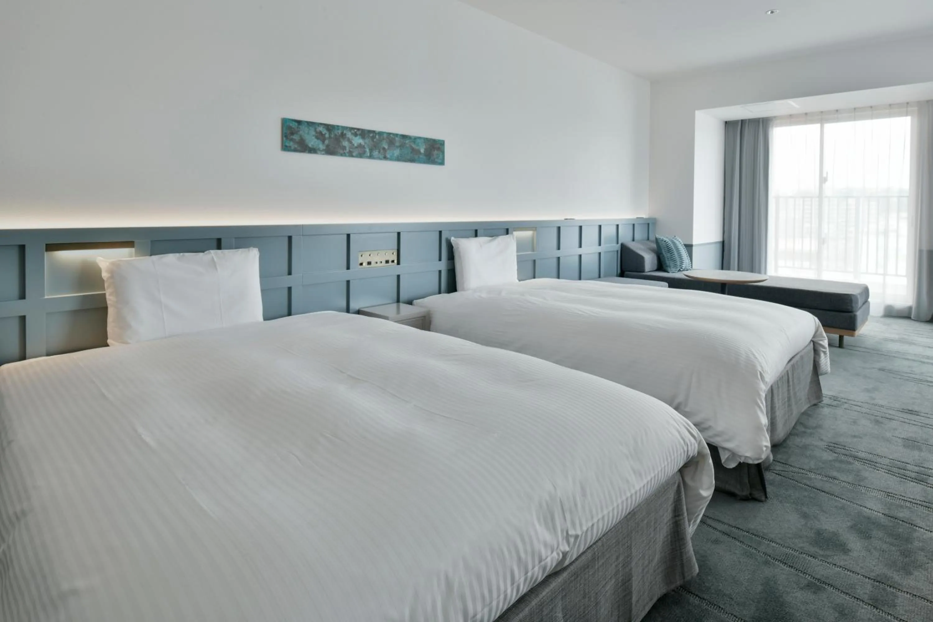 Bed in Lequ Okinawa Chatan Spa ＆ Resort