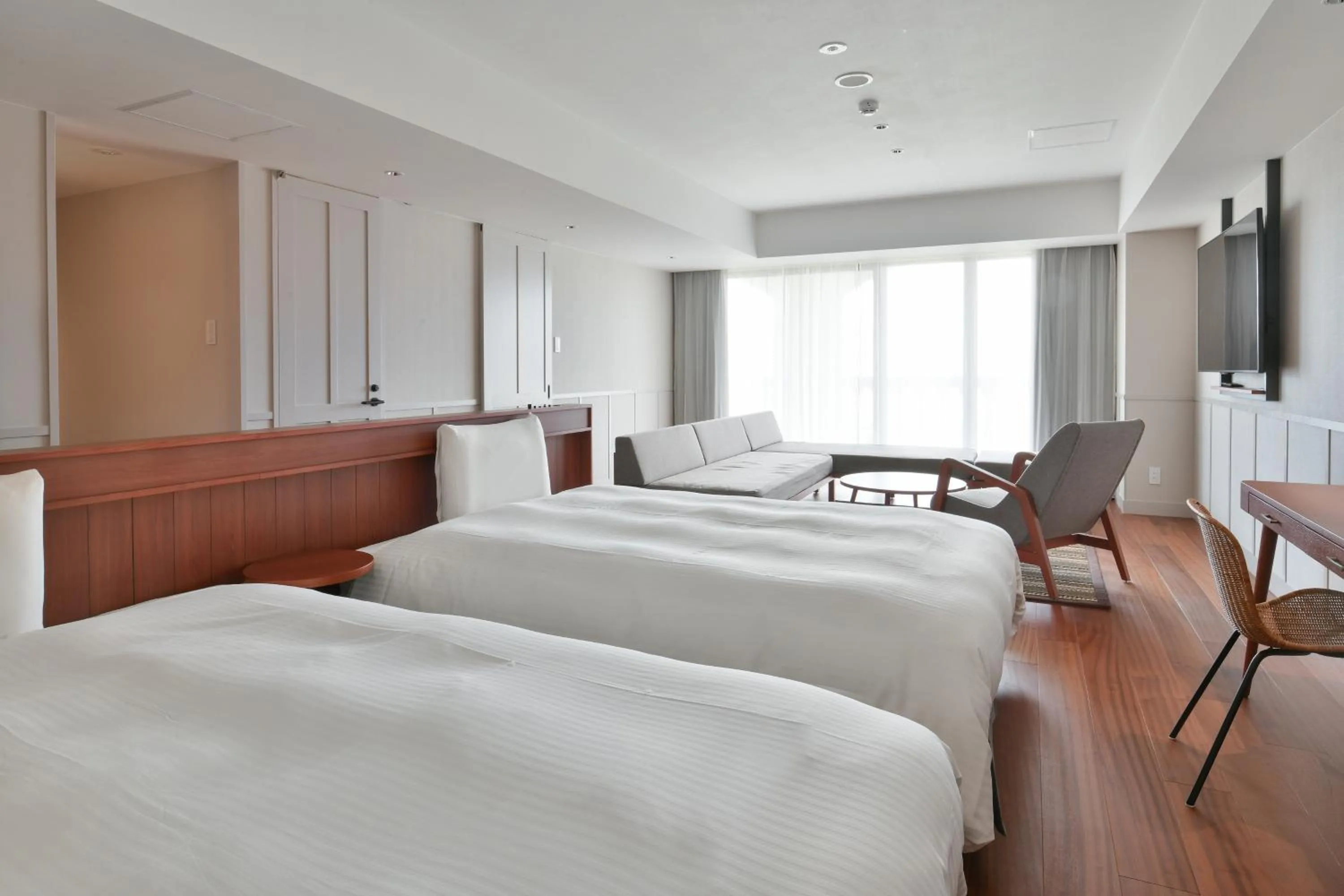 Bed in Lequ Okinawa Chatan Spa ＆ Resort