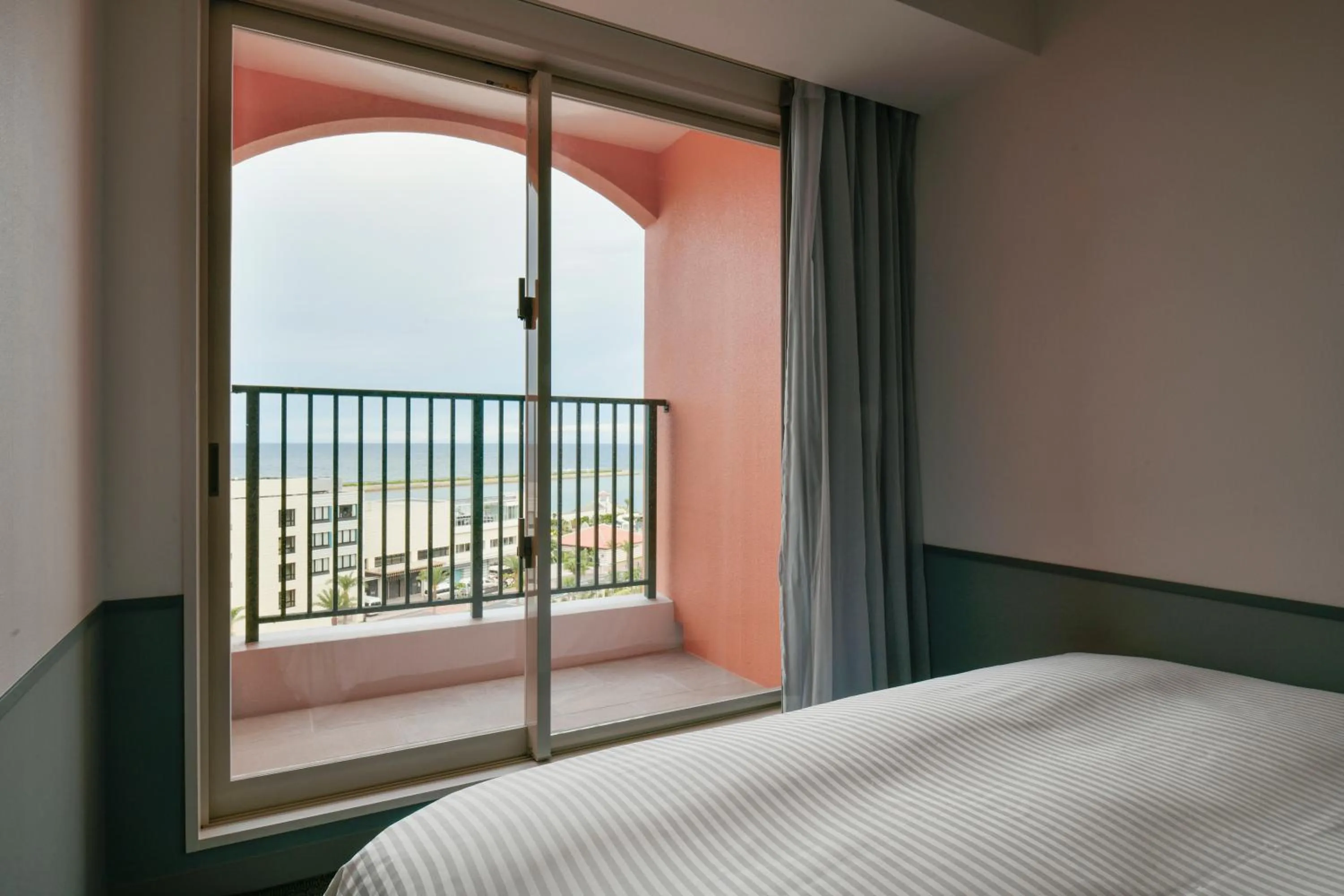 View (from property/room), Bed in Lequ Okinawa Chatan Spa ＆ Resort