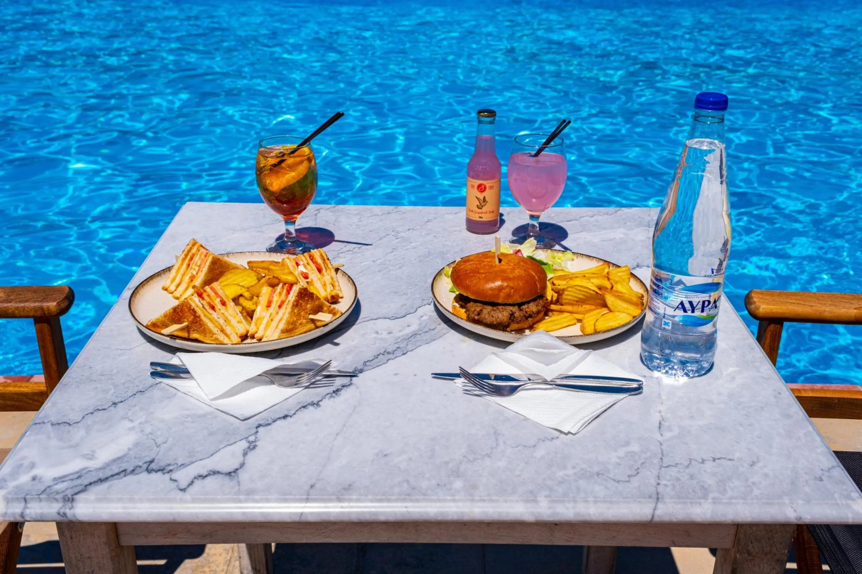 Swimming pool in Tsamadanis Hotel & Bungalows Friends Family