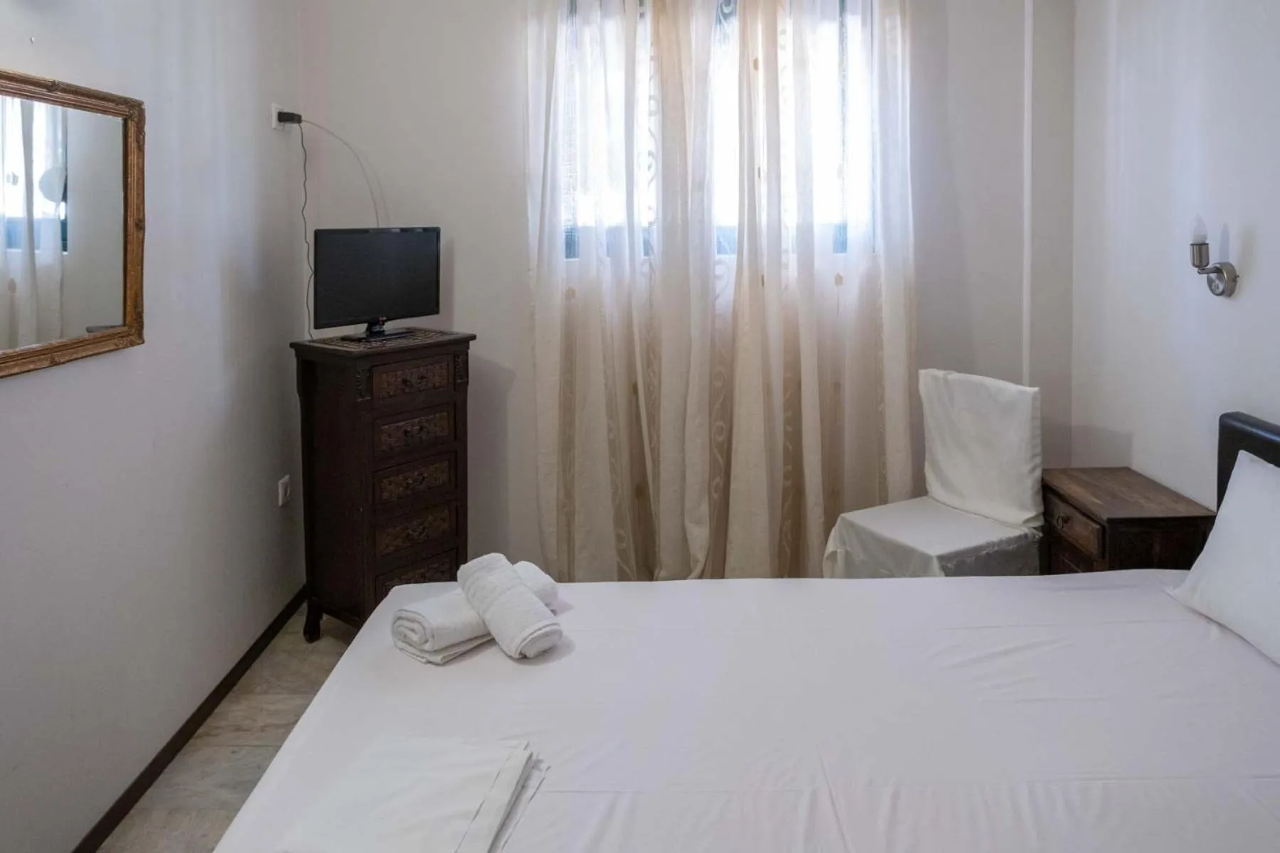 Bed in Tsamadanis Hotel & Bungalows Friends Family