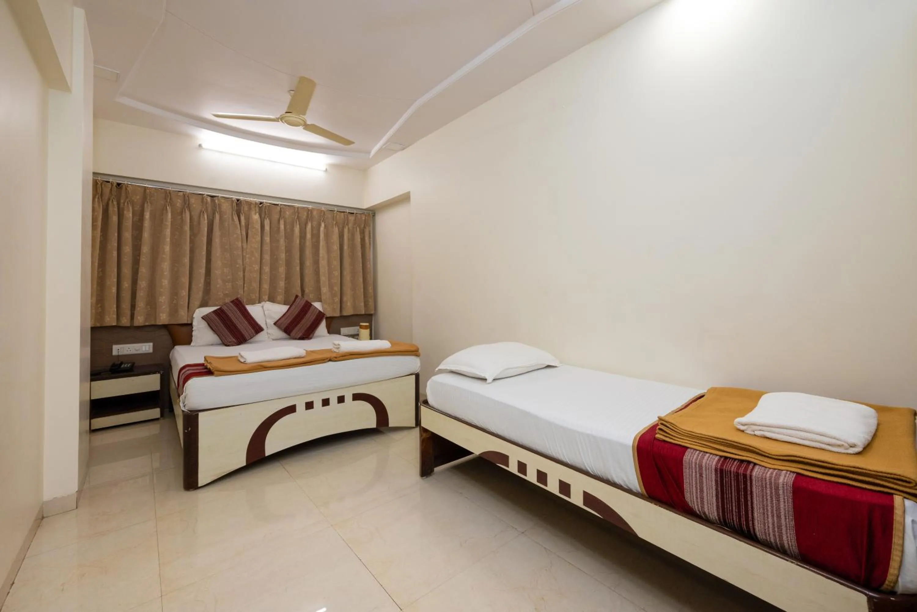 Photo of the whole room, Bed in Hotel Kalpana Palace, Mumbai