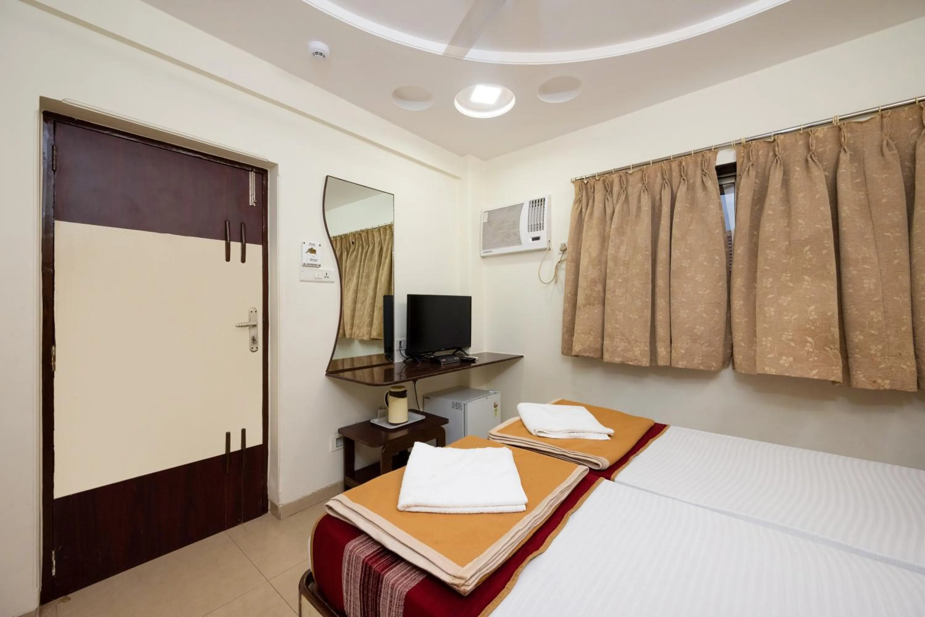 Bed in Hotel Kalpana Palace, Mumbai