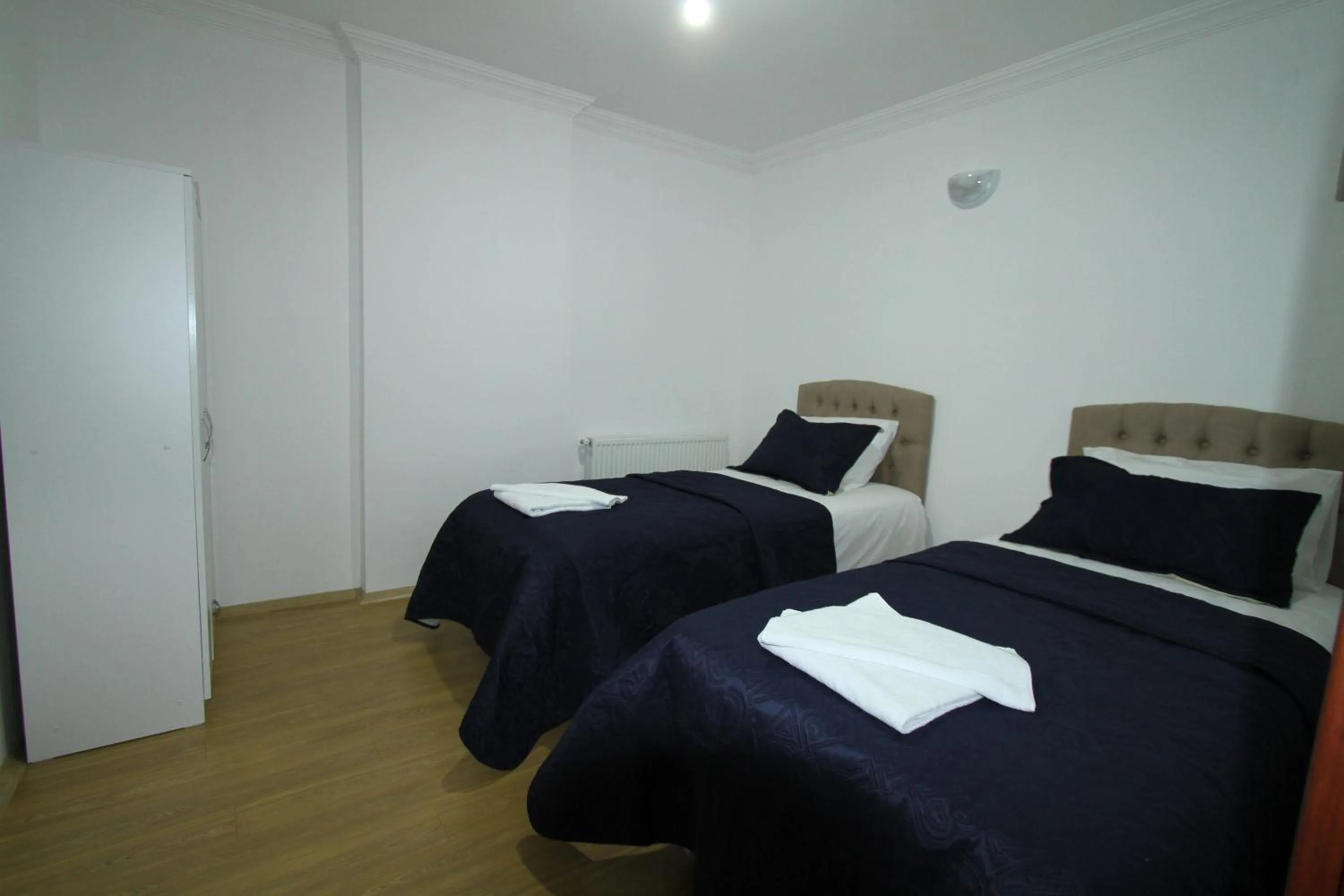 Bed in Asmir Suites Hotel