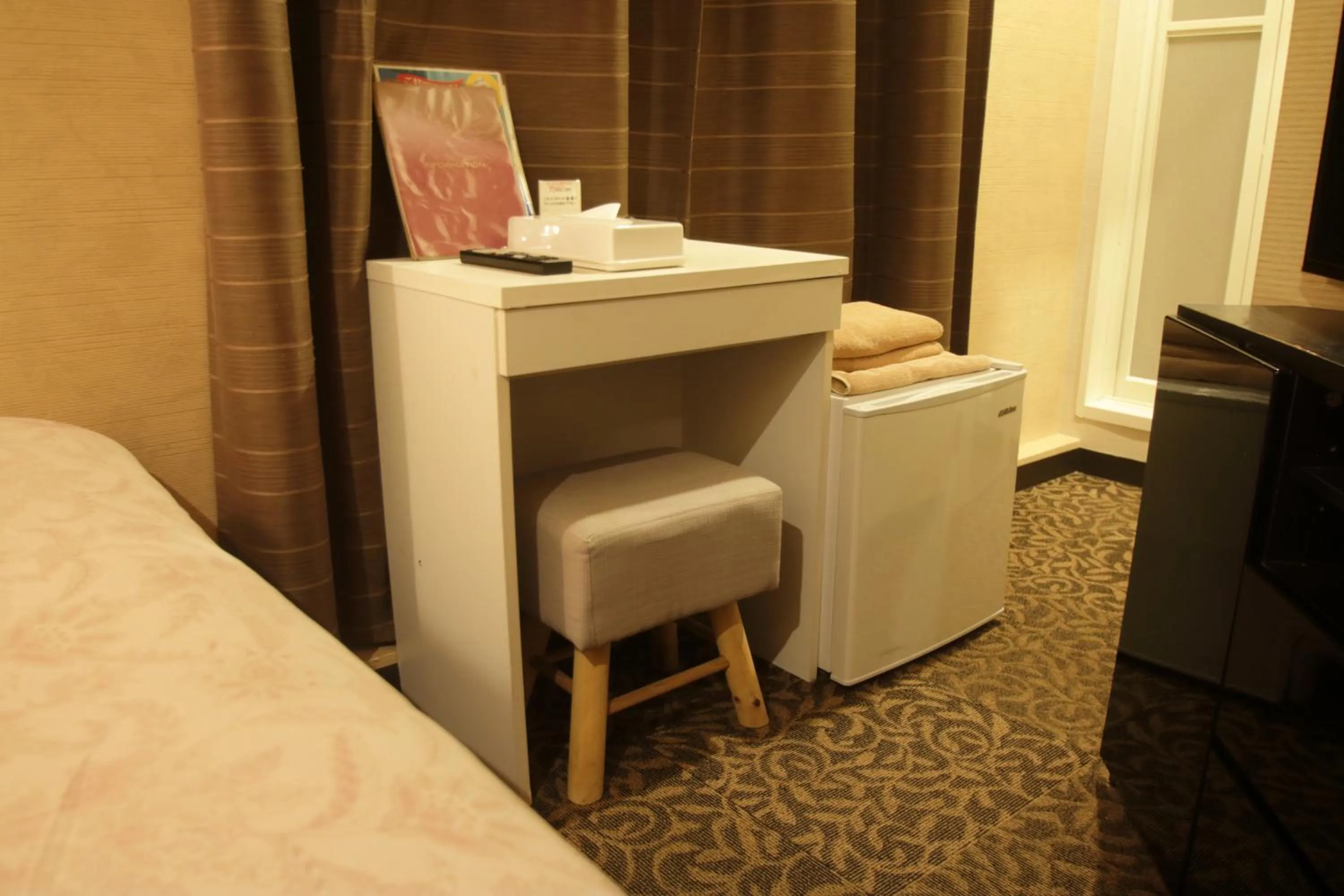 Bed in Tokyo Tourist Inn