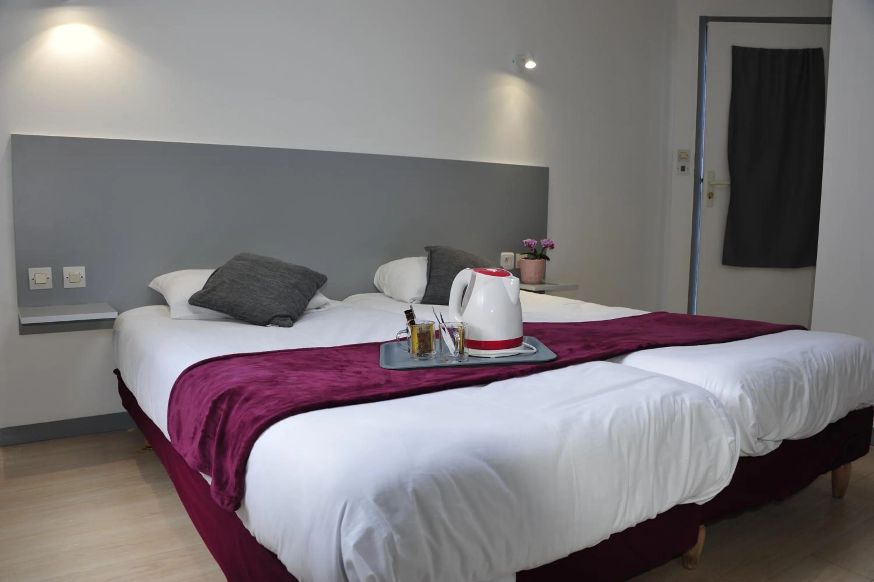 Bed in Hôtel de la baie de Paimpol