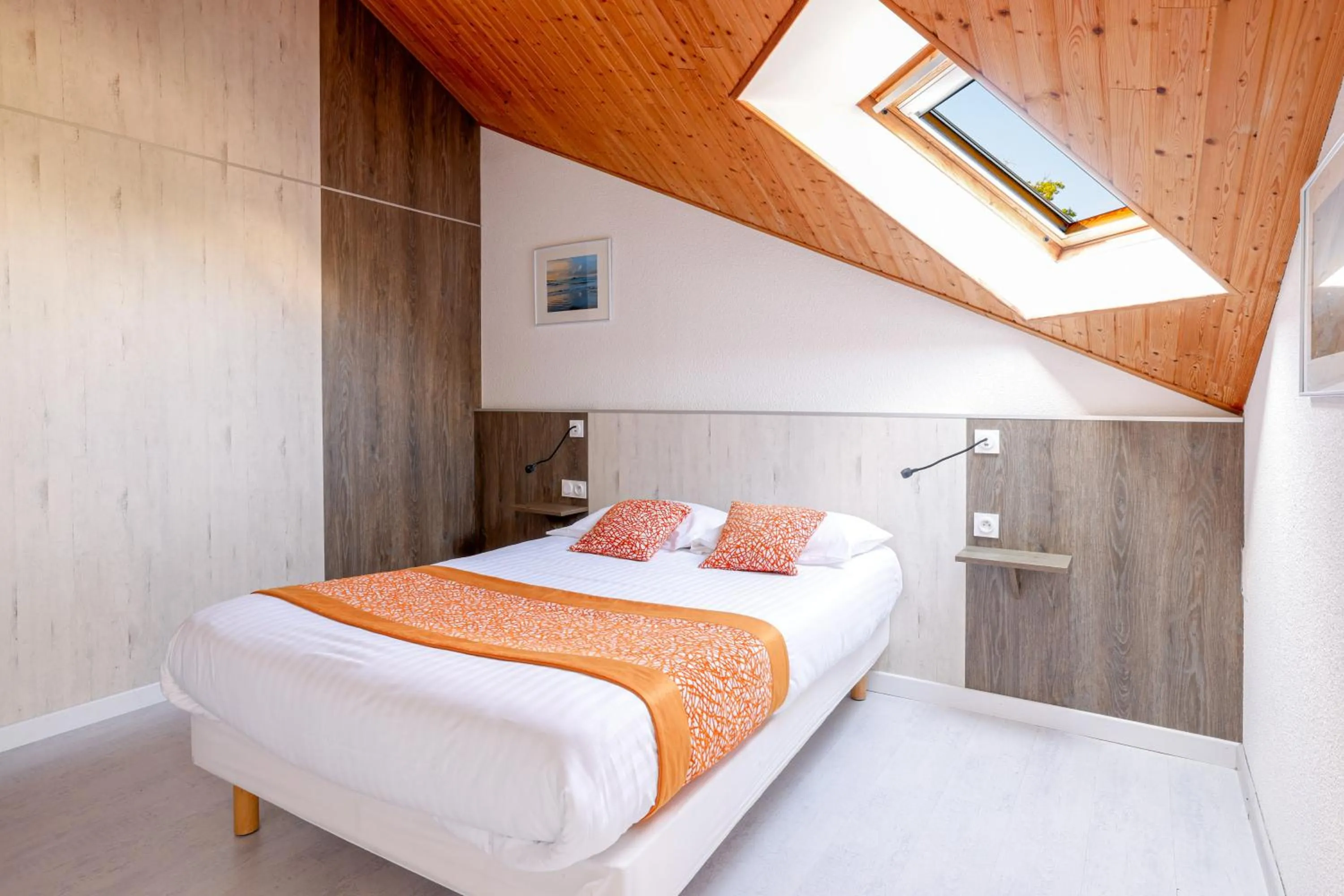 Bed in Hôtel de la baie de Paimpol