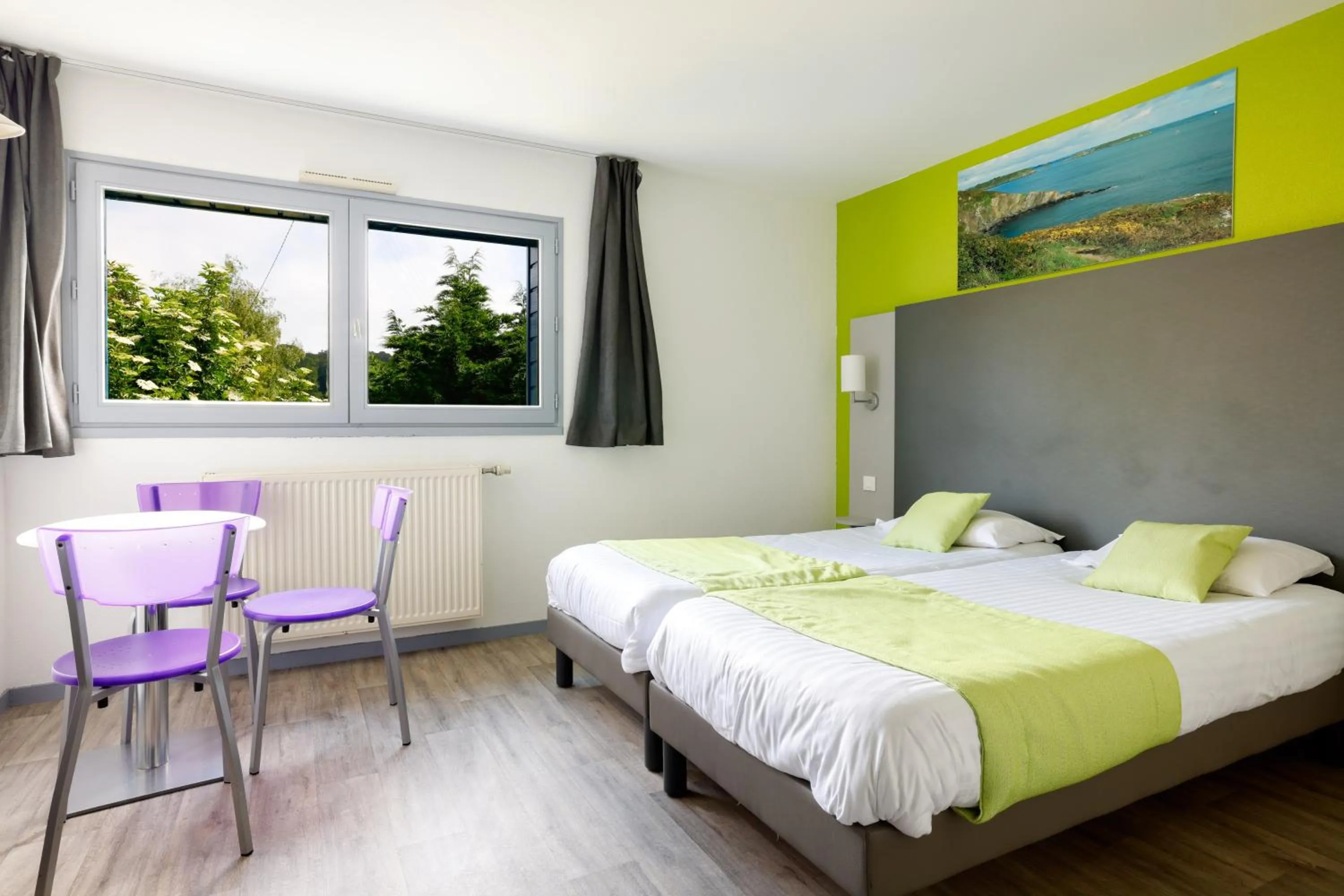 Bed in Hôtel de la baie de Paimpol