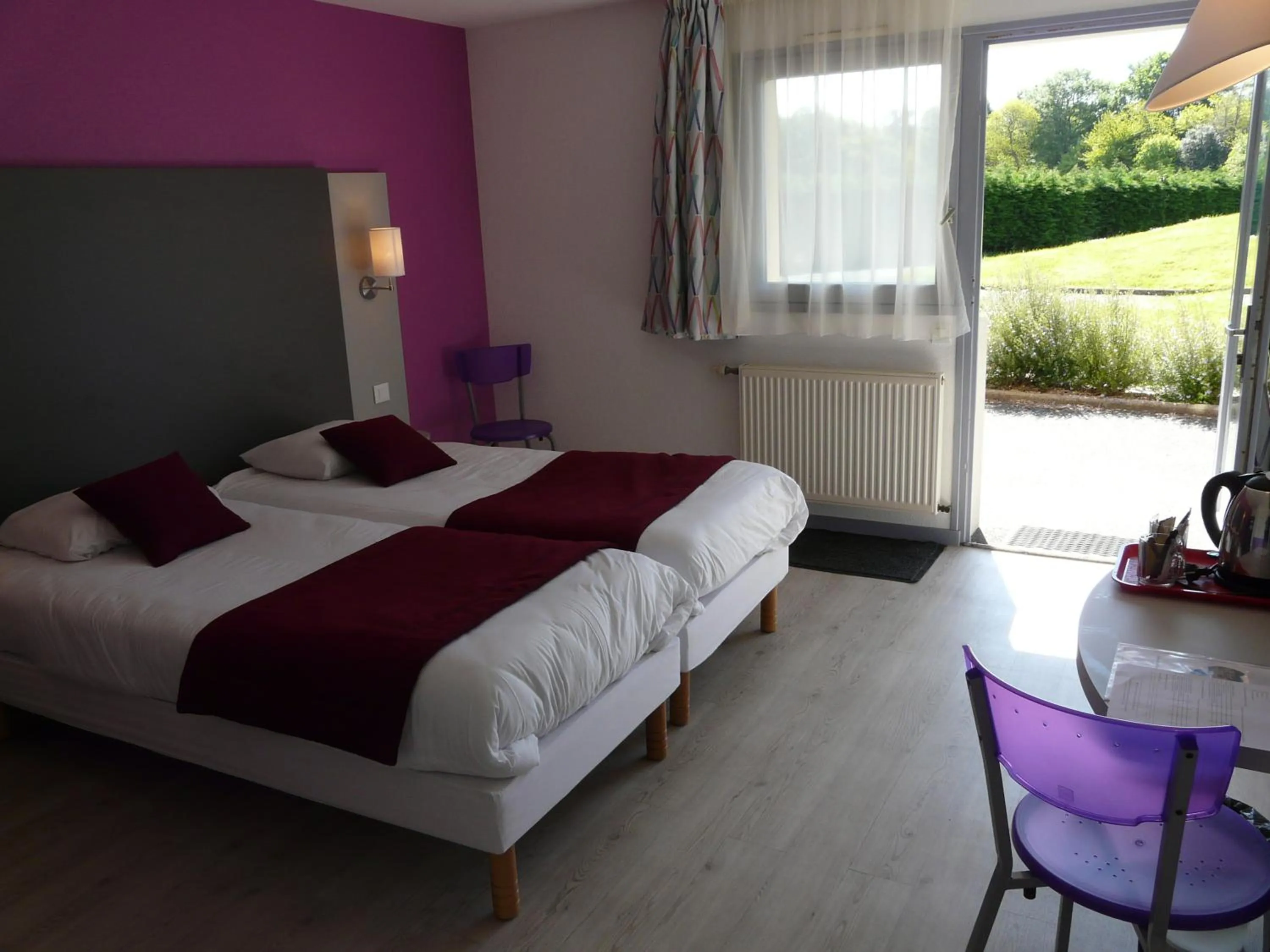 Bed in Hôtel de la baie de Paimpol