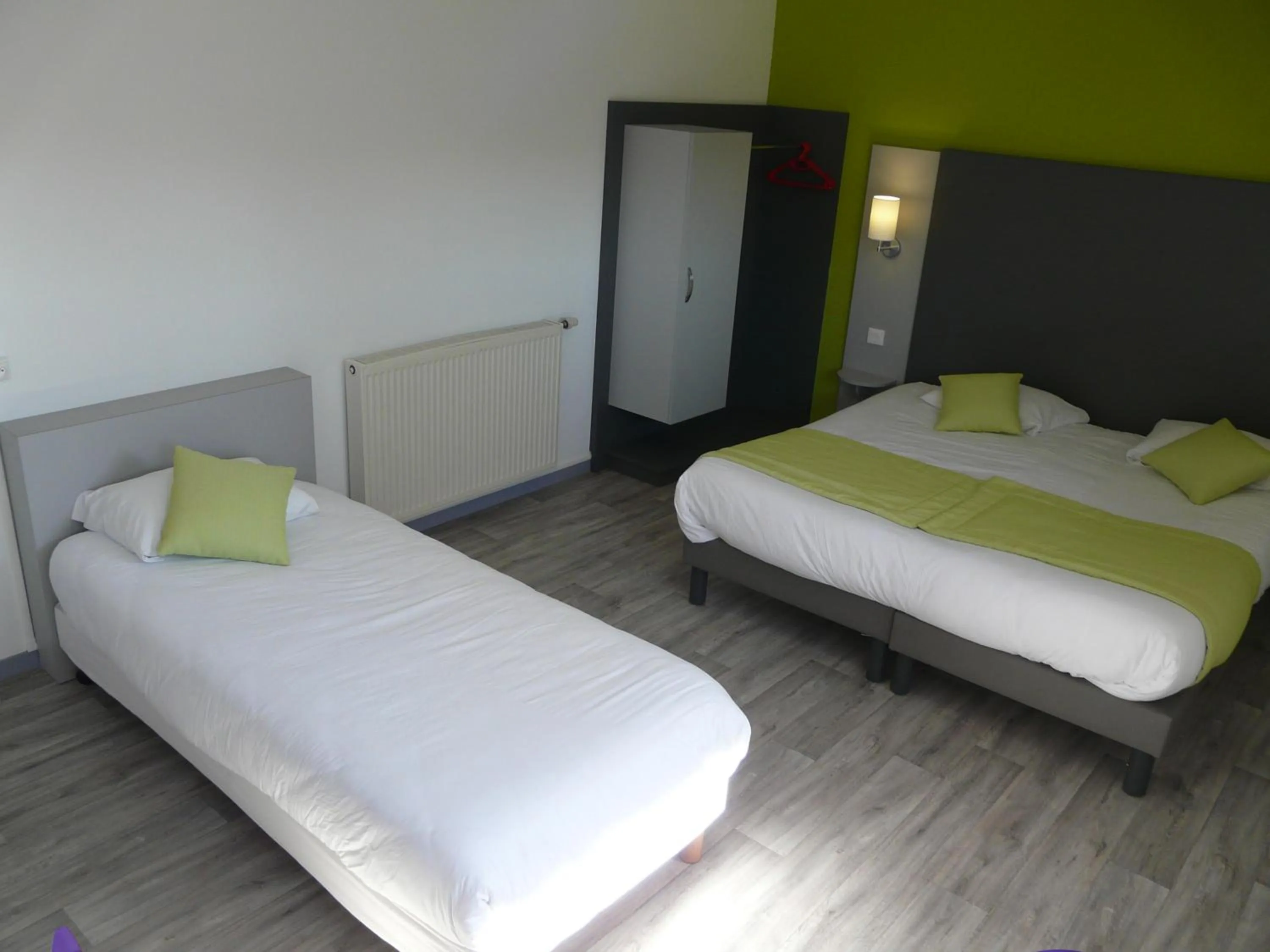 Bed in Hôtel de la baie de Paimpol