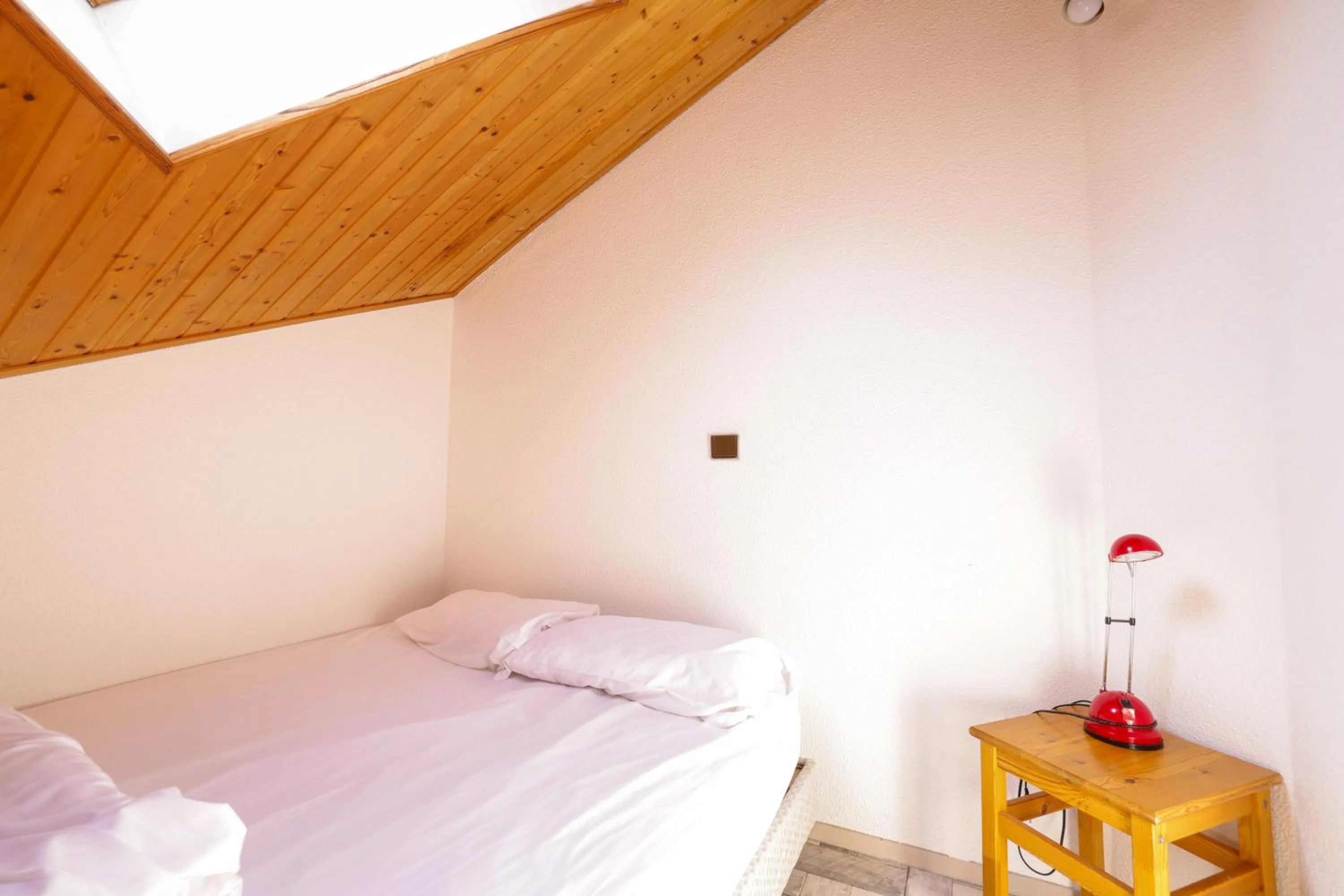 Bed in Hôtel de la baie de Paimpol